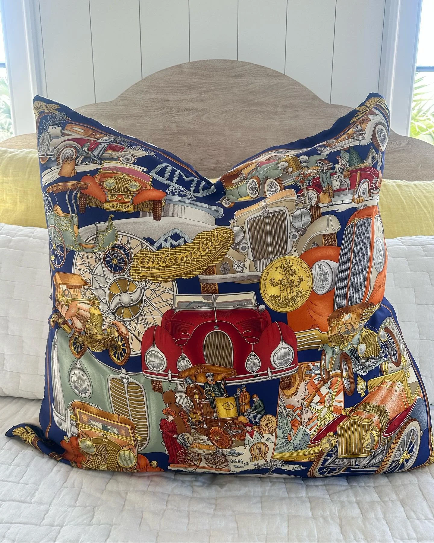 Commissioned for a true car enthusiast &mdash; this custom Herm&egrave;s silk pillow features luxe automotive details and timeless style. One-of-a-kind and sold. 

#Ciaobellayachtclub #luxuryinteriors #charleston #shoplocal #hermes #designerscarves #