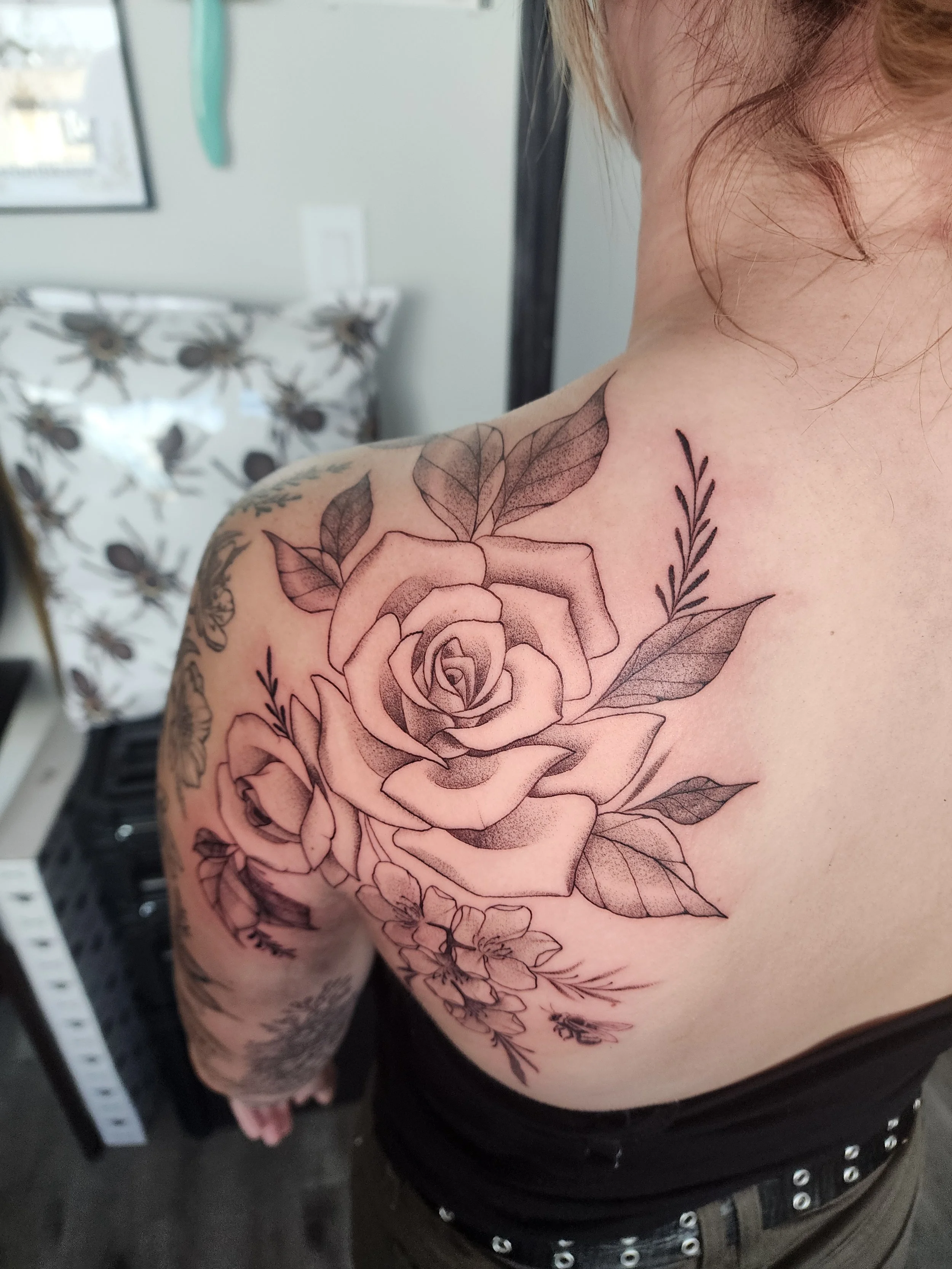Black and grey rose tattoo