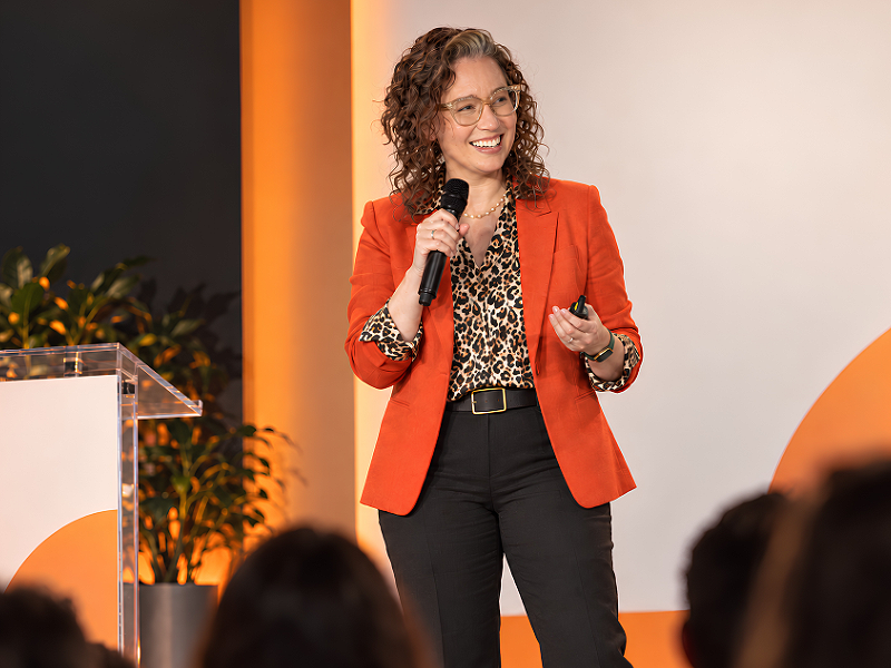 Angela Marie D'Antonio, neurodiversity speaker and advisor, delivering keynote on how to stop asking people to fit and start asking what needs to change.