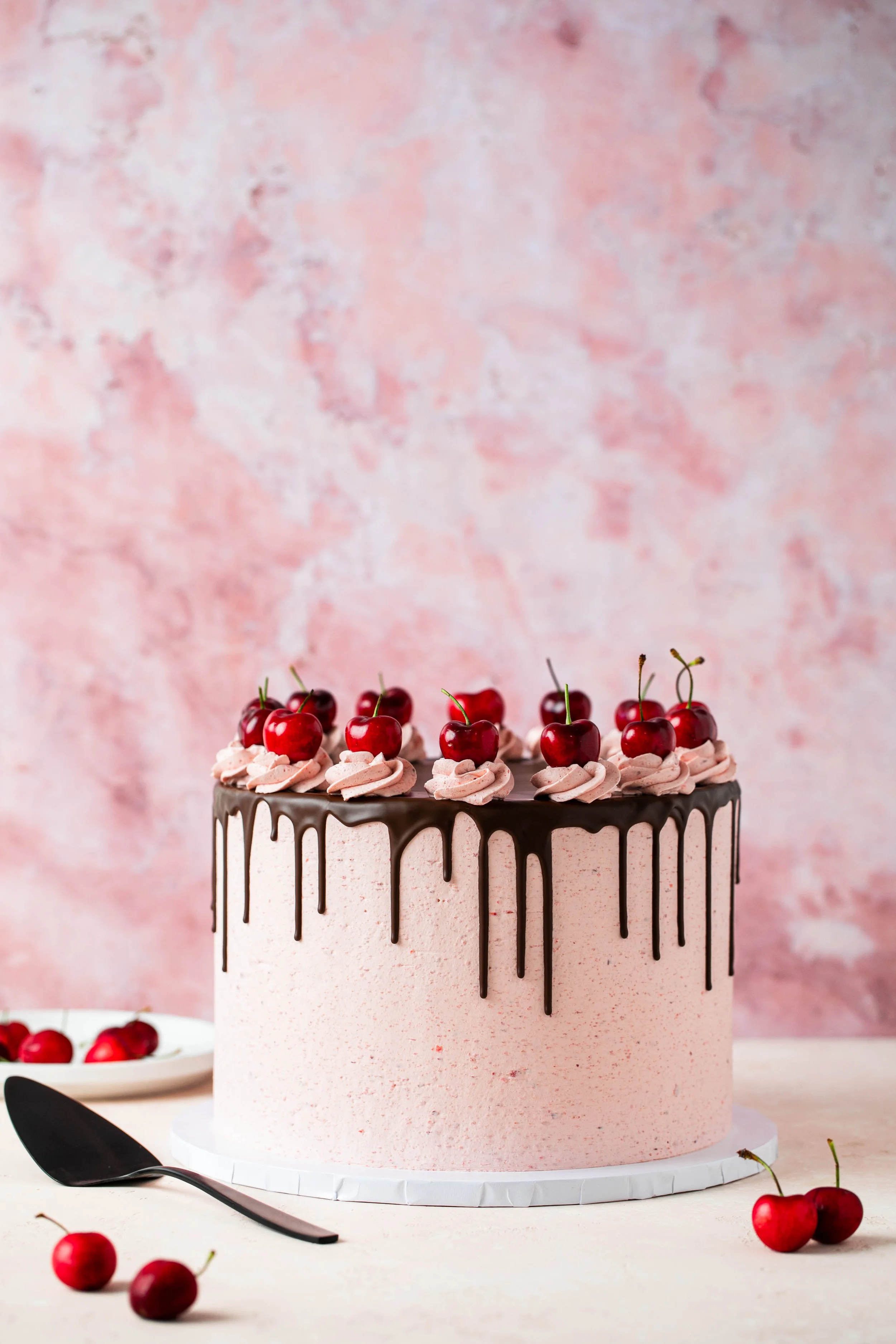 editorial style food photographer cherry chocolate chip cakes topped with fresh cherries chocolate drizzle seattle food dessert photographer