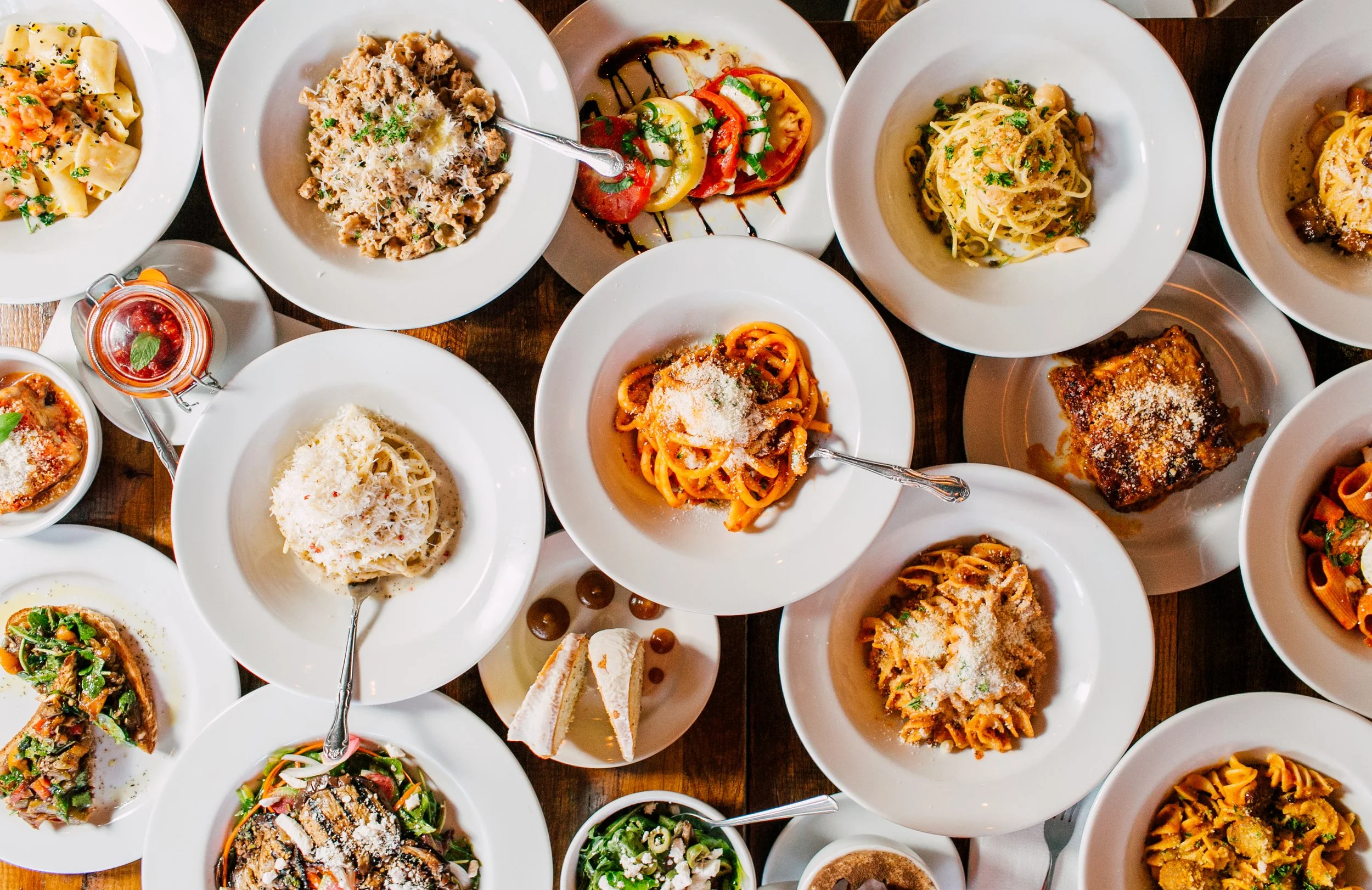 tons of plates of pasta due cucina italiana spaghetti party seattle restaurant photographer