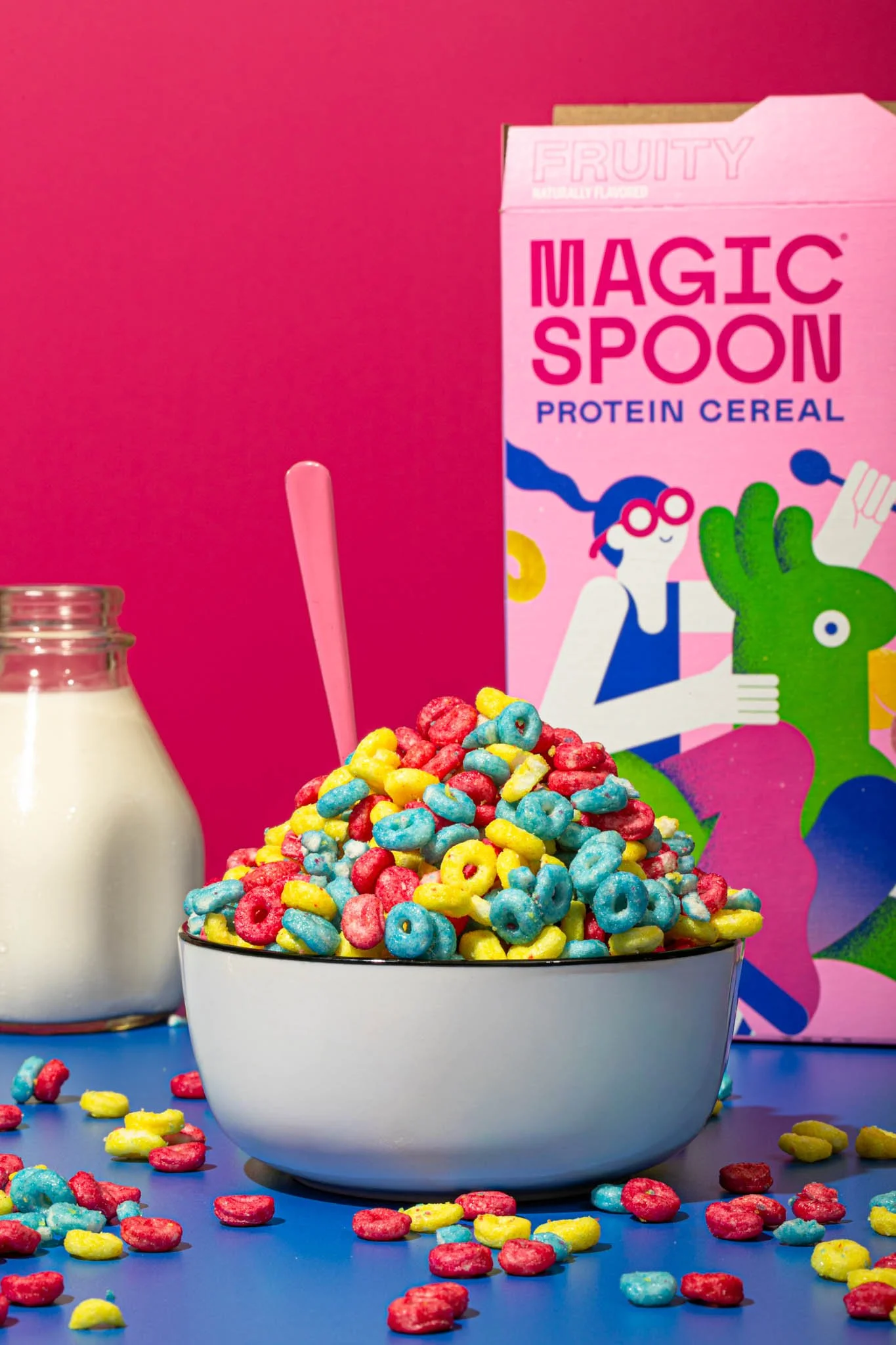 seattle packaged food product photographer colorful magic spoon cereal bright colorful modern photo cereal bowl piled high with colorful fruit loops 