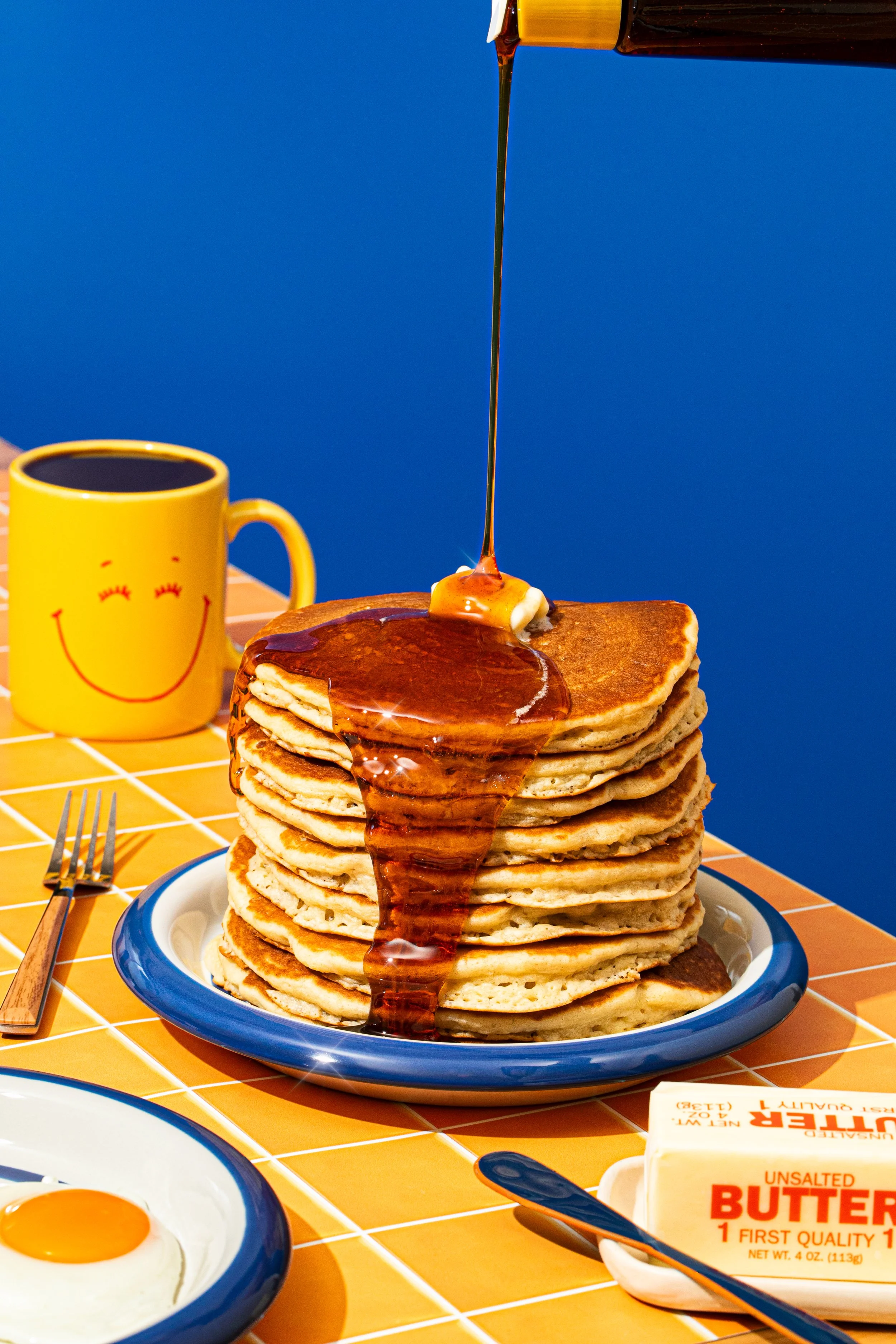 bright vintage inspired diner pancake stack sparkly syrup pour bright morning breakfast photography seattle 