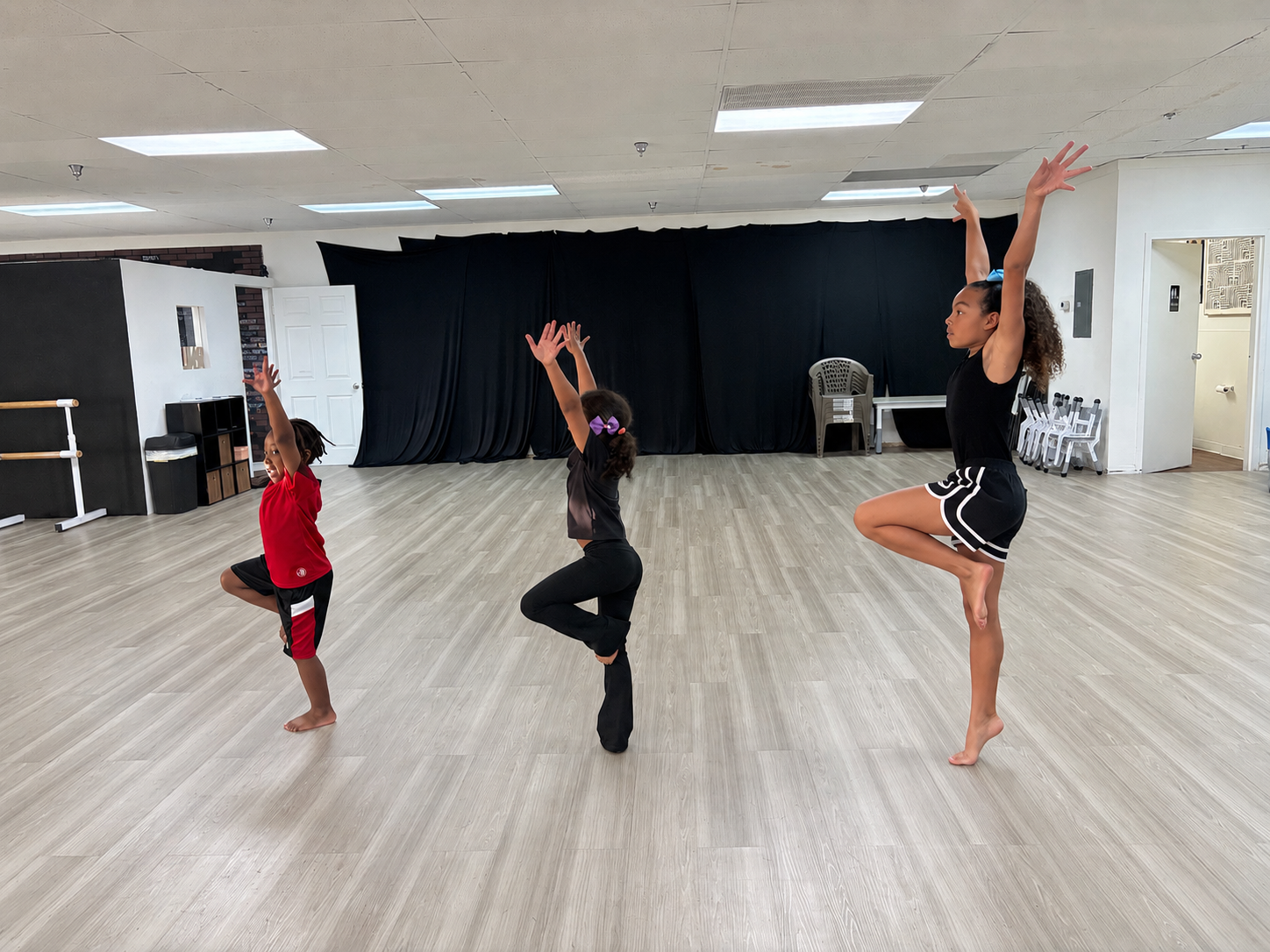 kids dancing - posse position