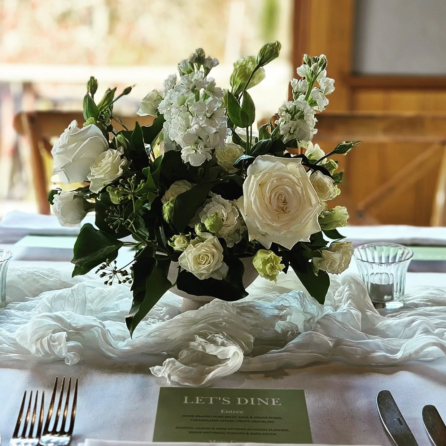 We love the layered look of ruffled table runners with beautiful compote arrangements & candles to set mood. 
.
.
.
#tablestyling #weddingreception #whitewedding #weddingflowers #tablearrangement #seasonalflowers #bowralwedding #centennialvineyar