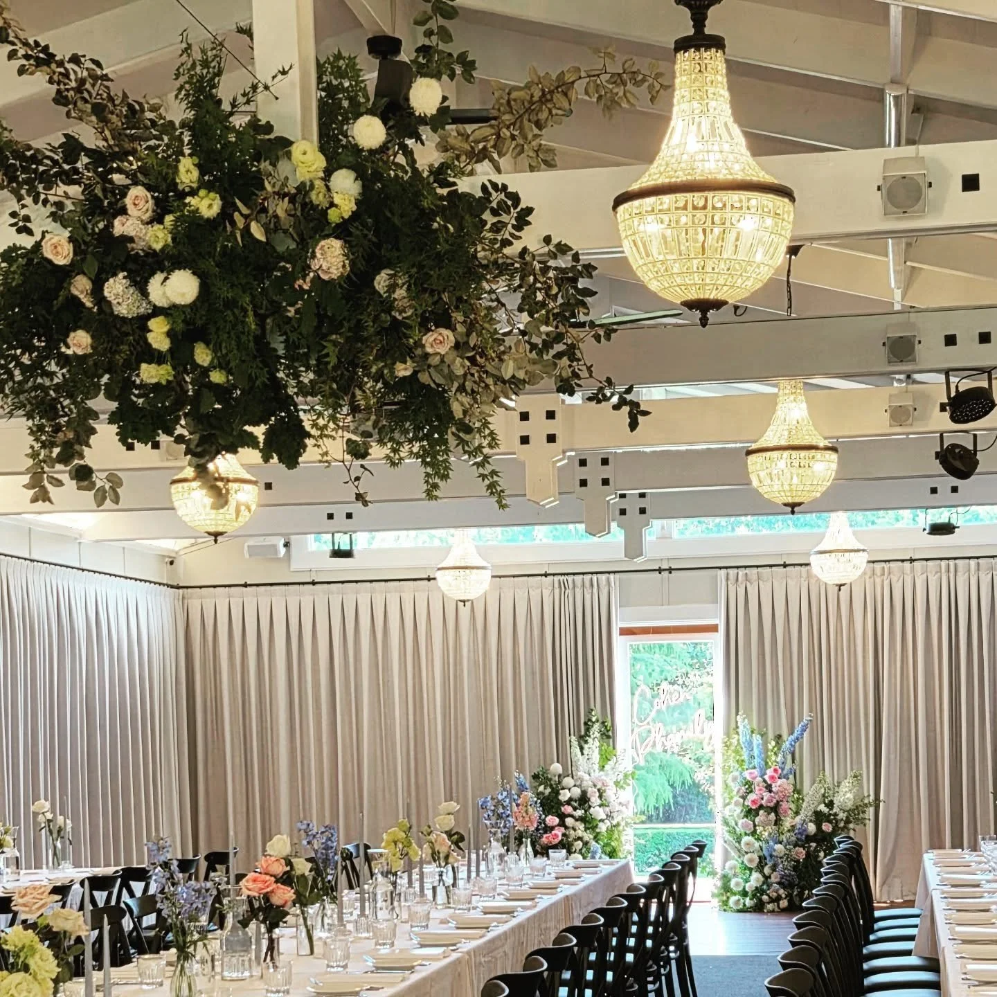 Cecile &amp; Jordan - 08.11.25 - Kalinya Estate 

Bud vases with taper candles for a simple table design &amp; a hanging foliage &amp; flower installation for extra impact &amp; the added bonus of re-purposing the ceremony flowers for a photo backdro