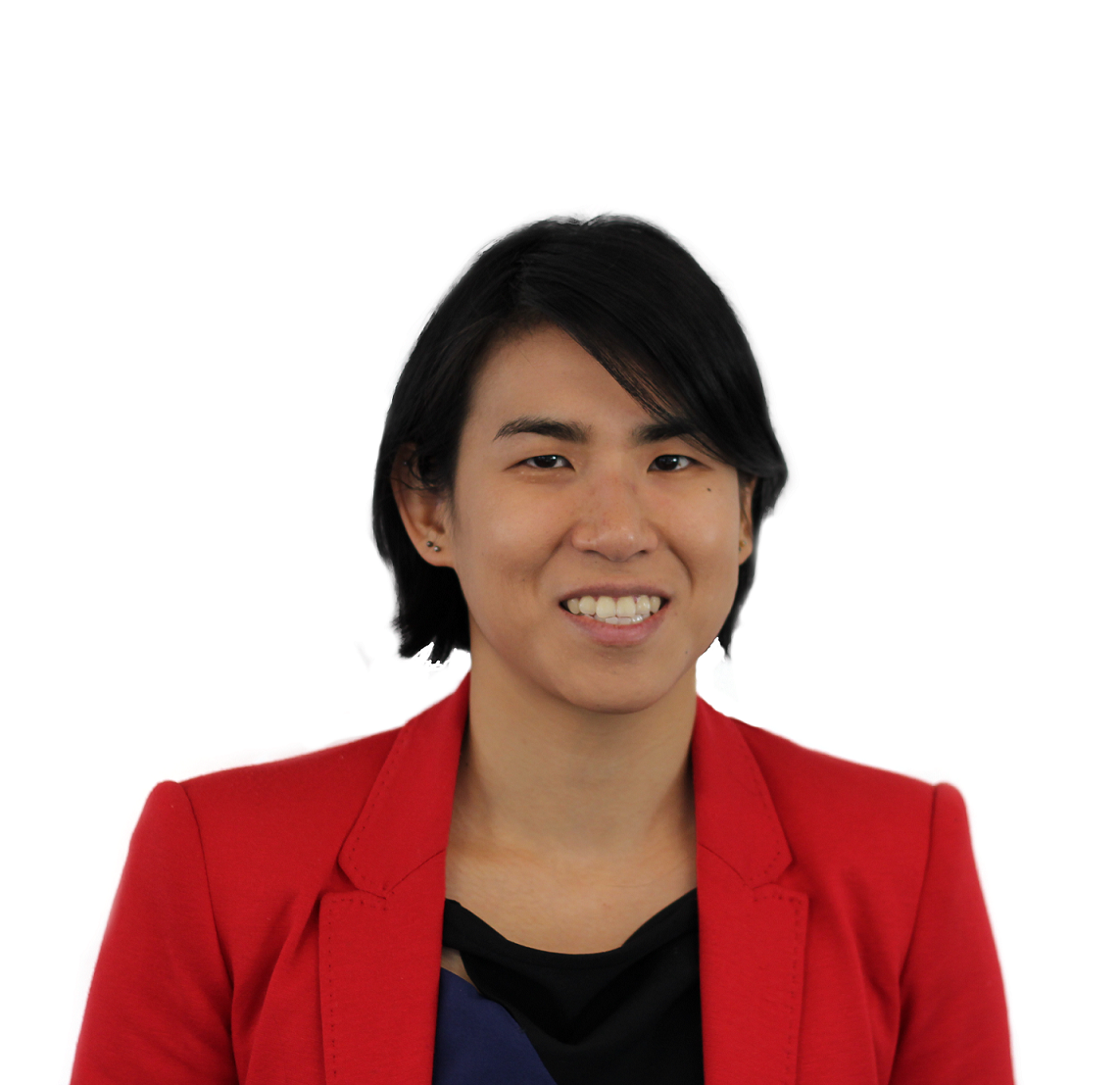 Portrait of a young woman with short black hair wearing a red blazer and smiling against a white background.