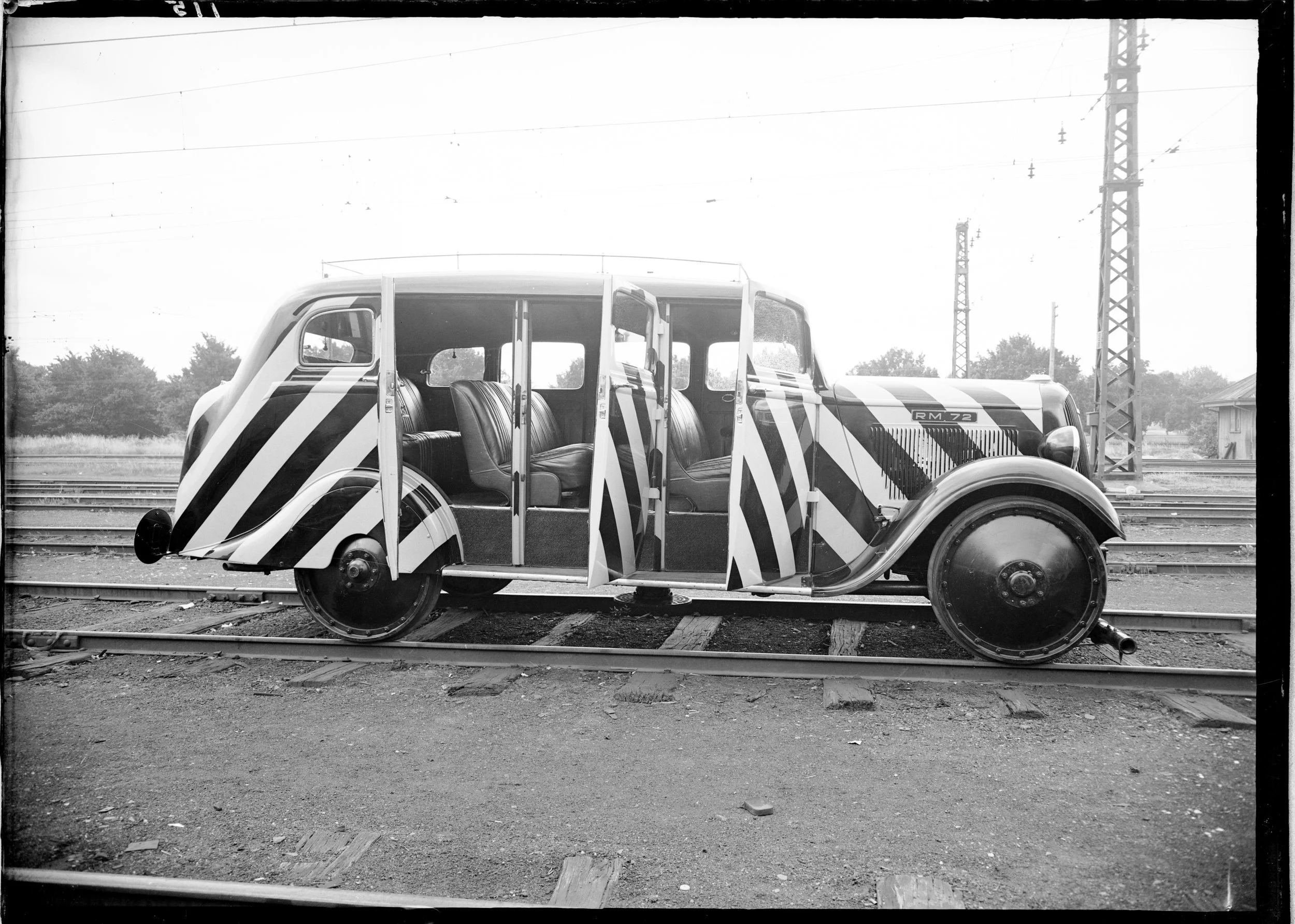 Dodge car with doors open.jpg