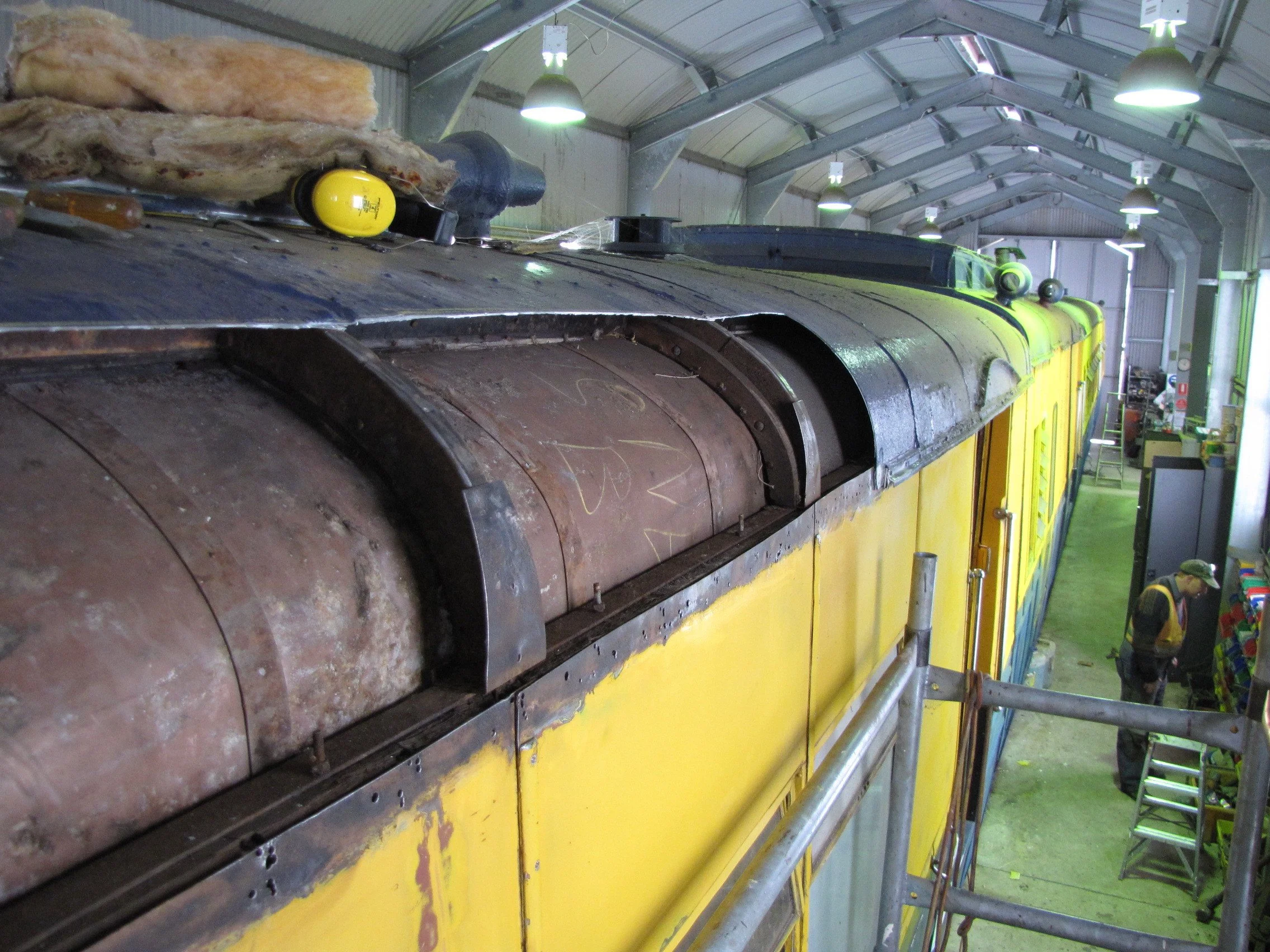 Part of 91s corroded Second Class car roof has been cut away to allow new sections to be fitted.jpg