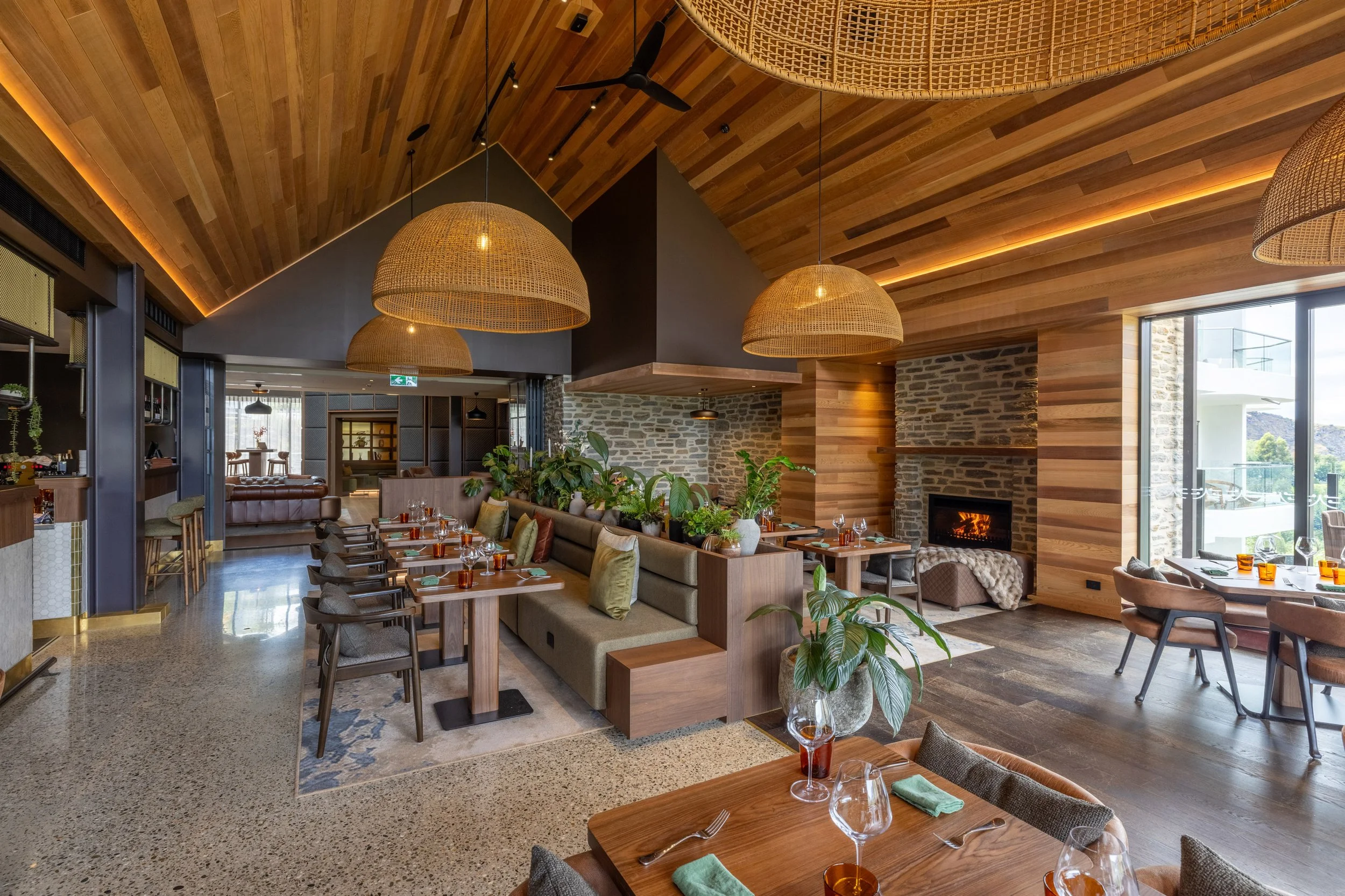 Interior of Elevation Bar & Restaurant Queenstown featuring warm timber design and alpine lodge atmosphere