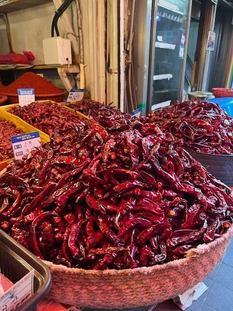 A basket of peppers at a market in Korea