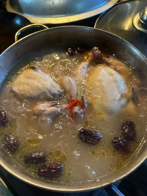 simmering chicken soup
