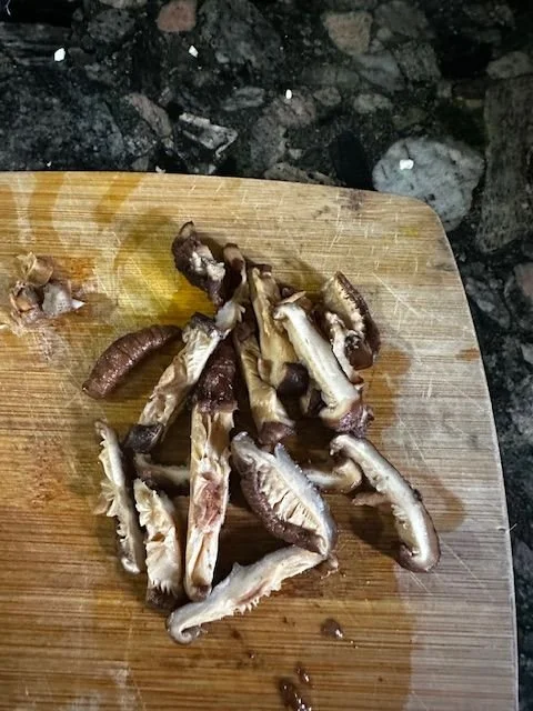 shiitake mushrooms on a cutting board