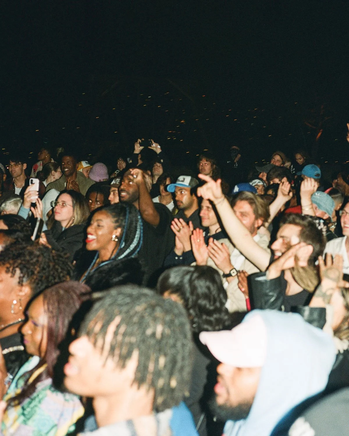 A flash photo of the crowd at Sam Austins outdoor release show in Los Angeles.