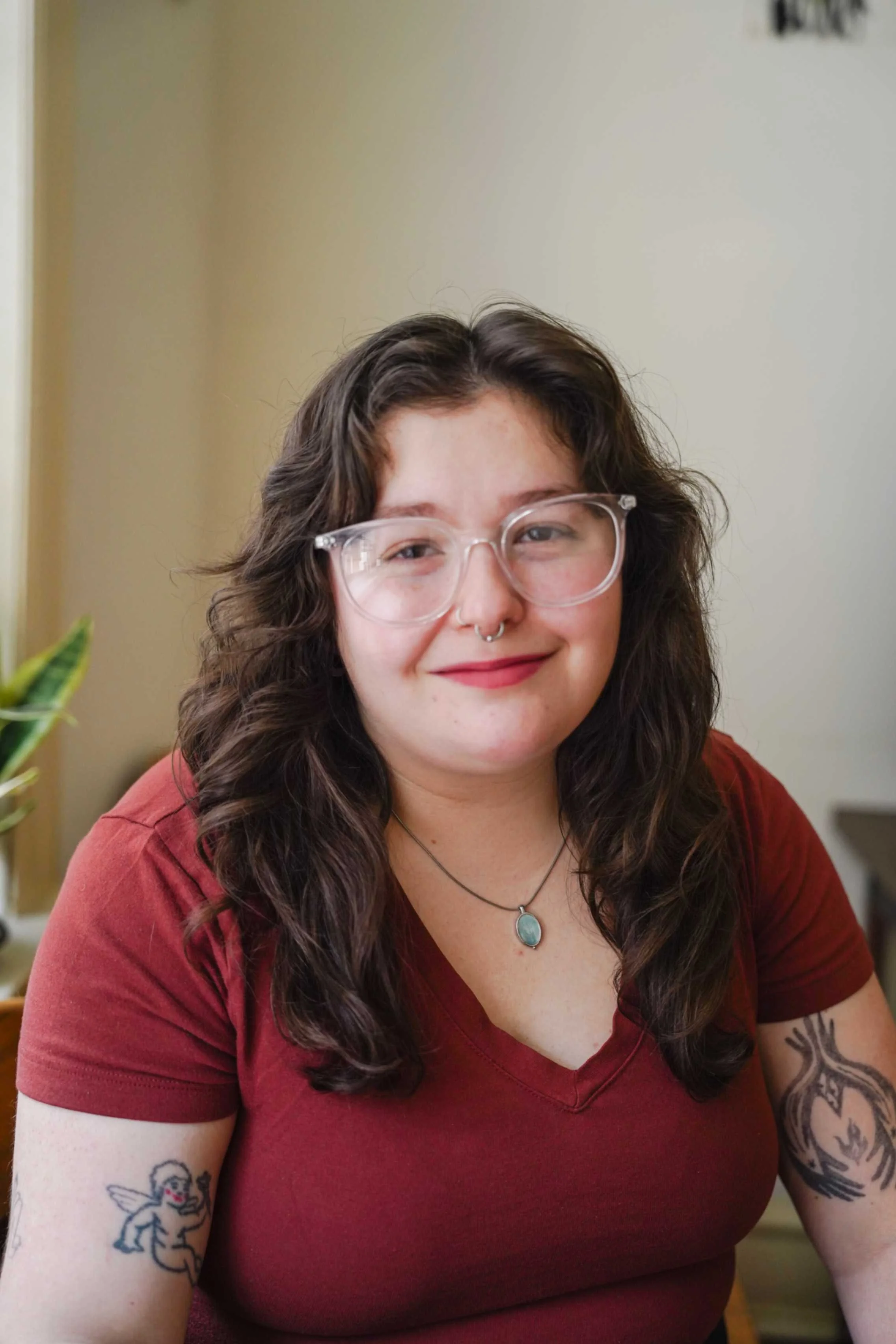photo of philadelphia based doula smiling in her home