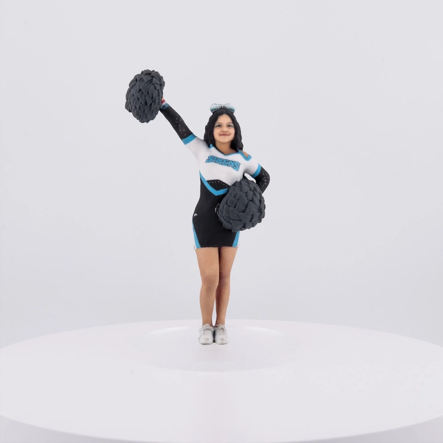 Look at that detail! We absolutely love how this custom cheerleader figurine turned out. Capturing the energy and excitement of your greatest moments is what we do best here.

#Mein3D #3DPrinting #CustomFigurine #PersonalizedGifts #Cheerleading