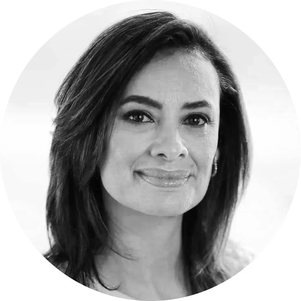 Black and white headshot of Maria Teresa Kumar.