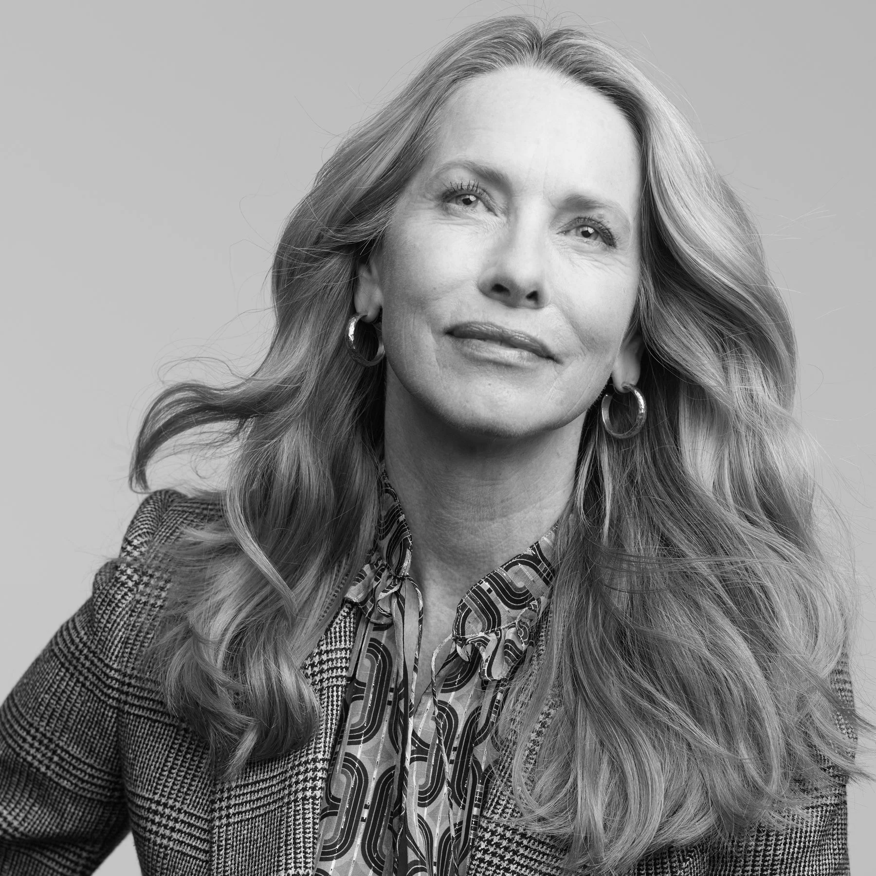 Black and white portrait of Laurene Powell Jobs.