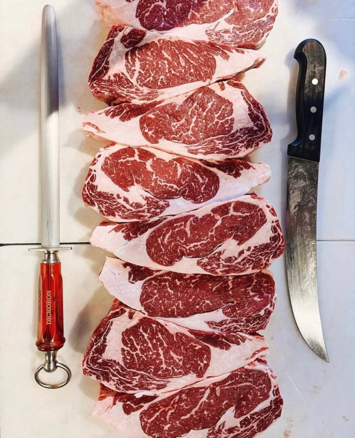 Geometric drawing of an outline square with sections divided by vertical, horizontal, and half circle lines.