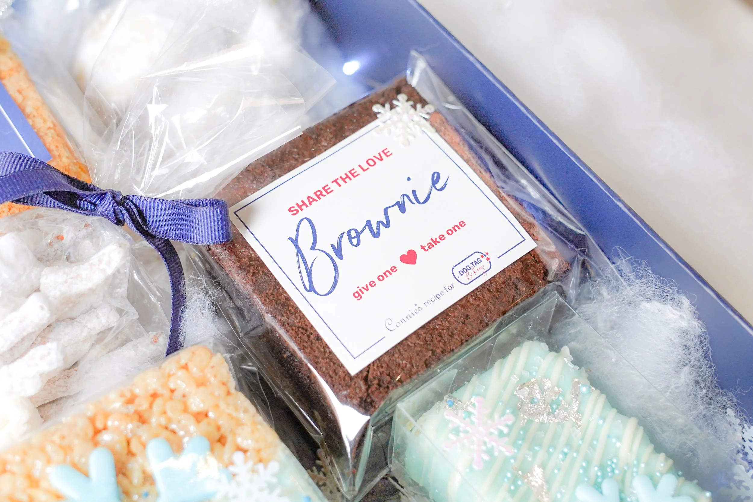 Gift box with brownie and snacks featuring 'Share the Love' label.