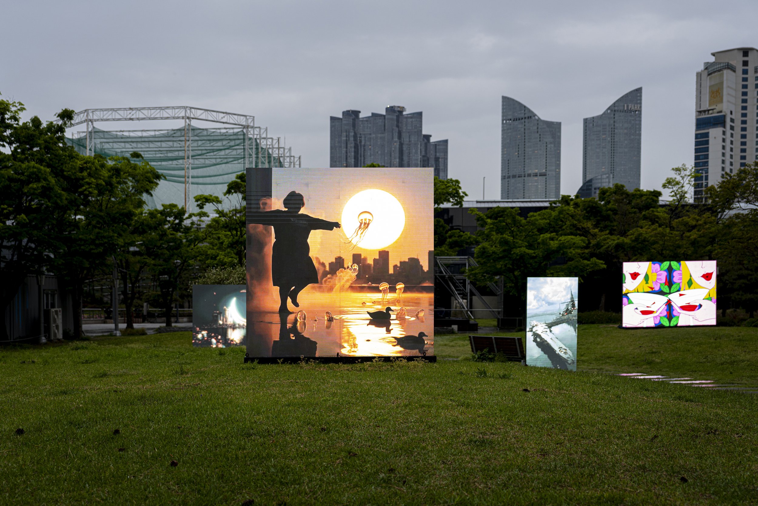"19:19" by niceaunties on a 2x2m outdoor LED screen, Busan Museum of Art Sculpture Garden. Digital Subculture: Narrative & Story in the Digital Era, 23 April to 28 June 2026