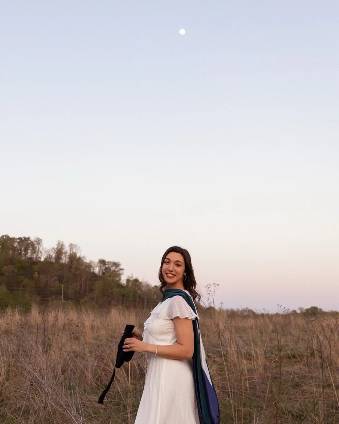 The moon popped in to say hello during my grad session with Irene! 🌙

Who said grad photos could be on campus? They can take place anywhere you want them to!! students who aren&rsquo;t super attached to a campus (such as commuters or online students