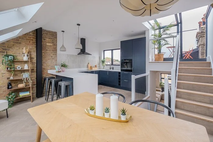 Open-plan living and dining area with modern kitchen design
