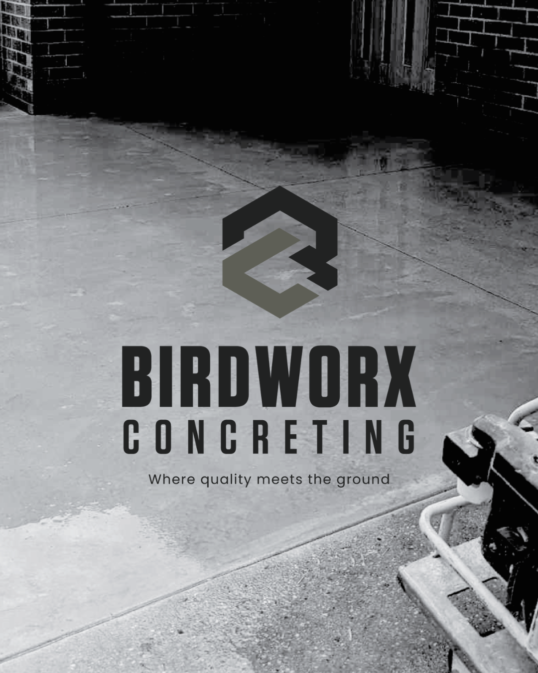 Black and white photo of a concrete sidewalk and building with brick wall. Overlaid text reads, 'BIRDWORX CONCRETEING - Where quality meets the ground' with a logo of a stylized concrete block.