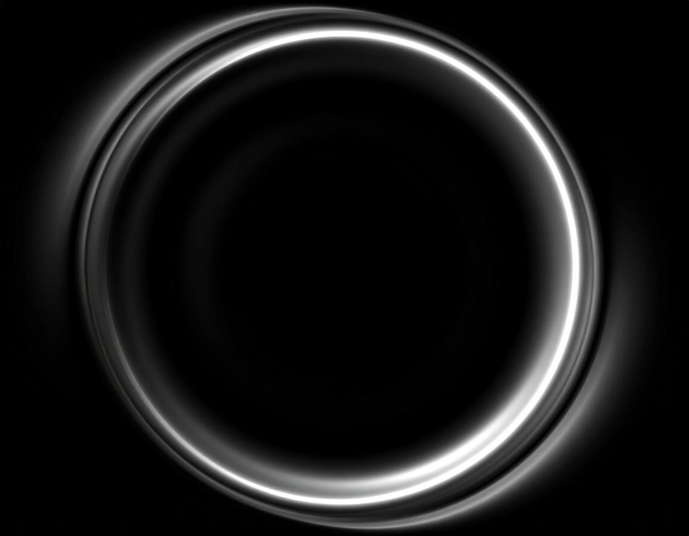 Mirrored panel on desert sand, reflecting sunset with bright yellow sun.