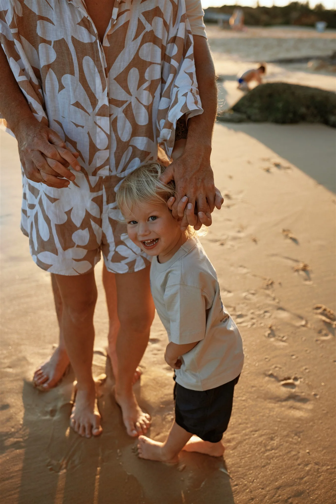Family of four at Redhead Beach Newcastle photographed by Daina Marie Photography