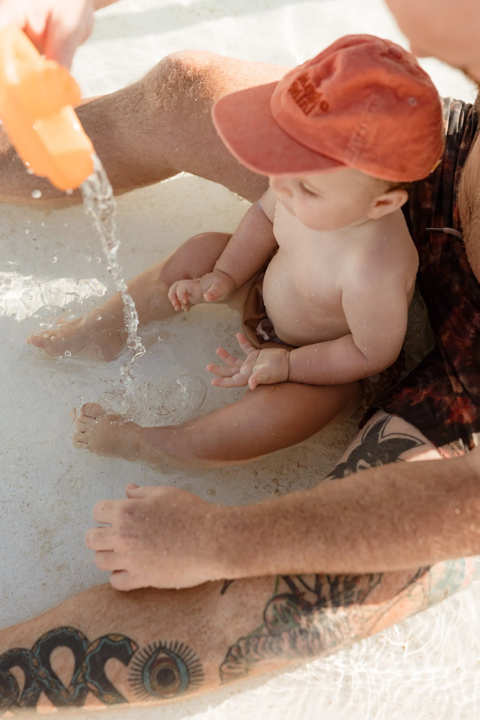 Candid family photography at Newcastle Ocean Baths by Daina Marie Photography
