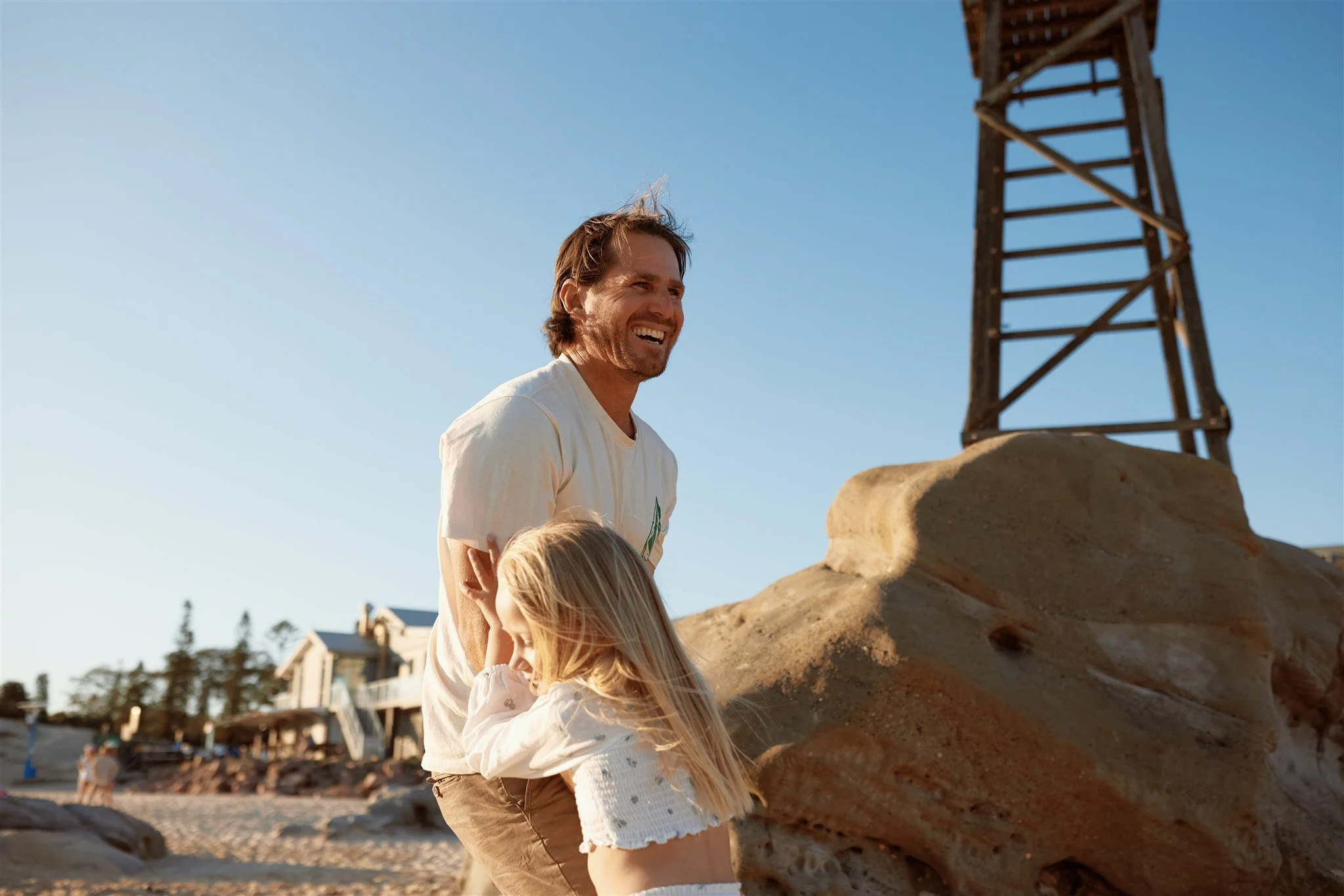 Toddler and primary school aged kids playing at Redhead Beach captured by Newcastle family photographer
