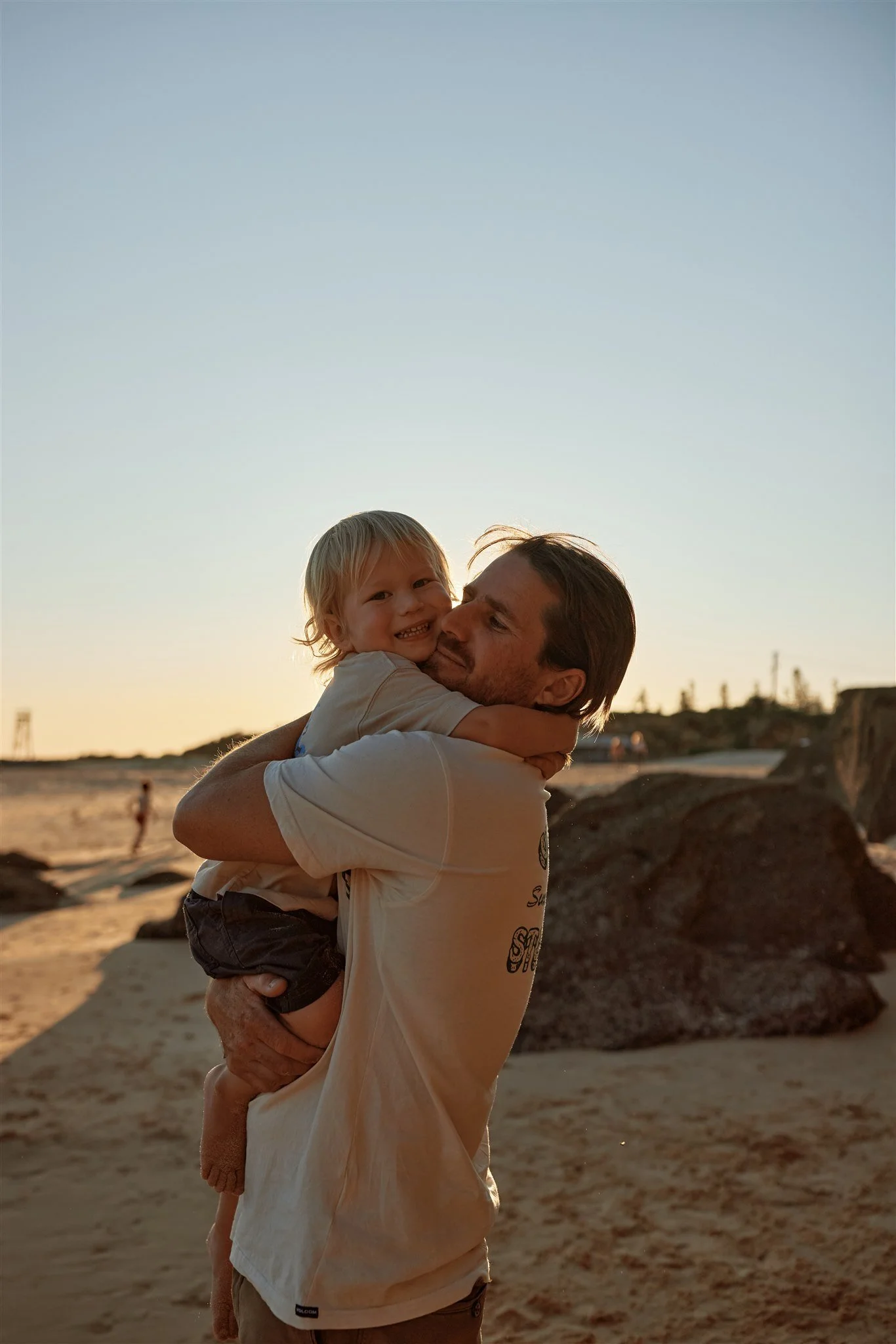 Family of four at Redhead Beach Newcastle photographed by Daina Marie Photography