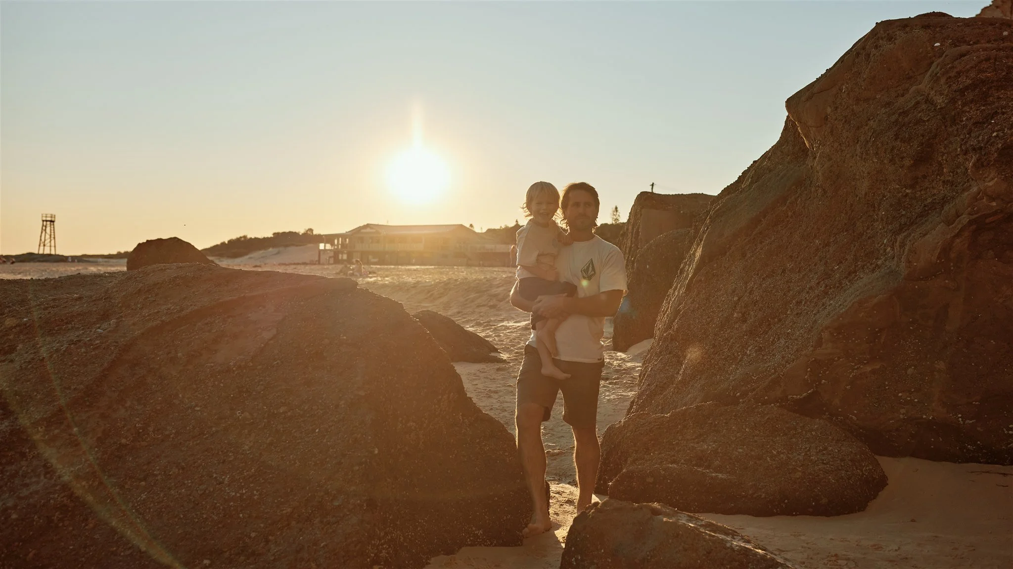 Heartfelt golden hour family moments at Redhead Beach Newcastle by Daina Marie Photography