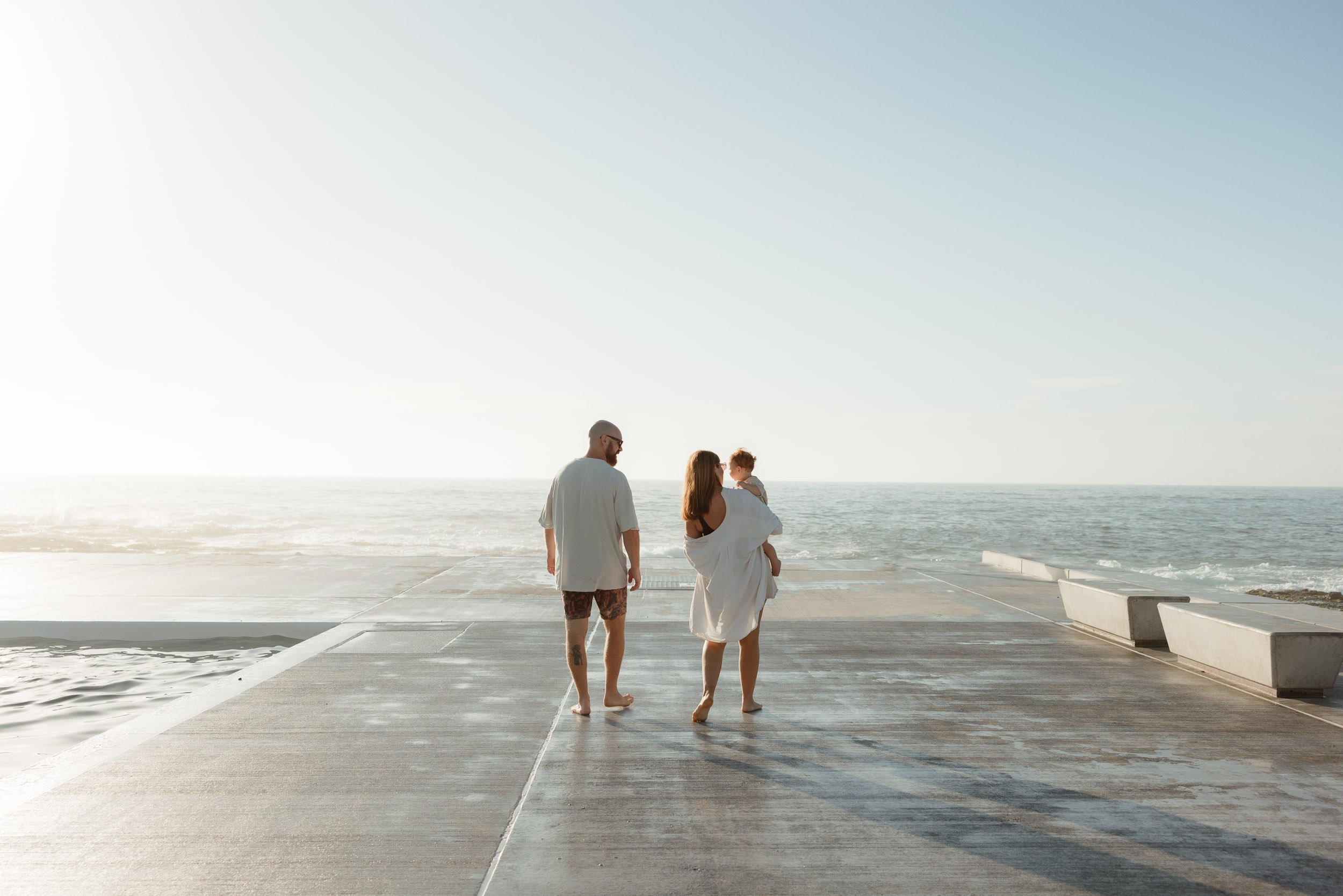 Natural and candid family moments at Newcastle Ocean Baths by Daina Marie Photography