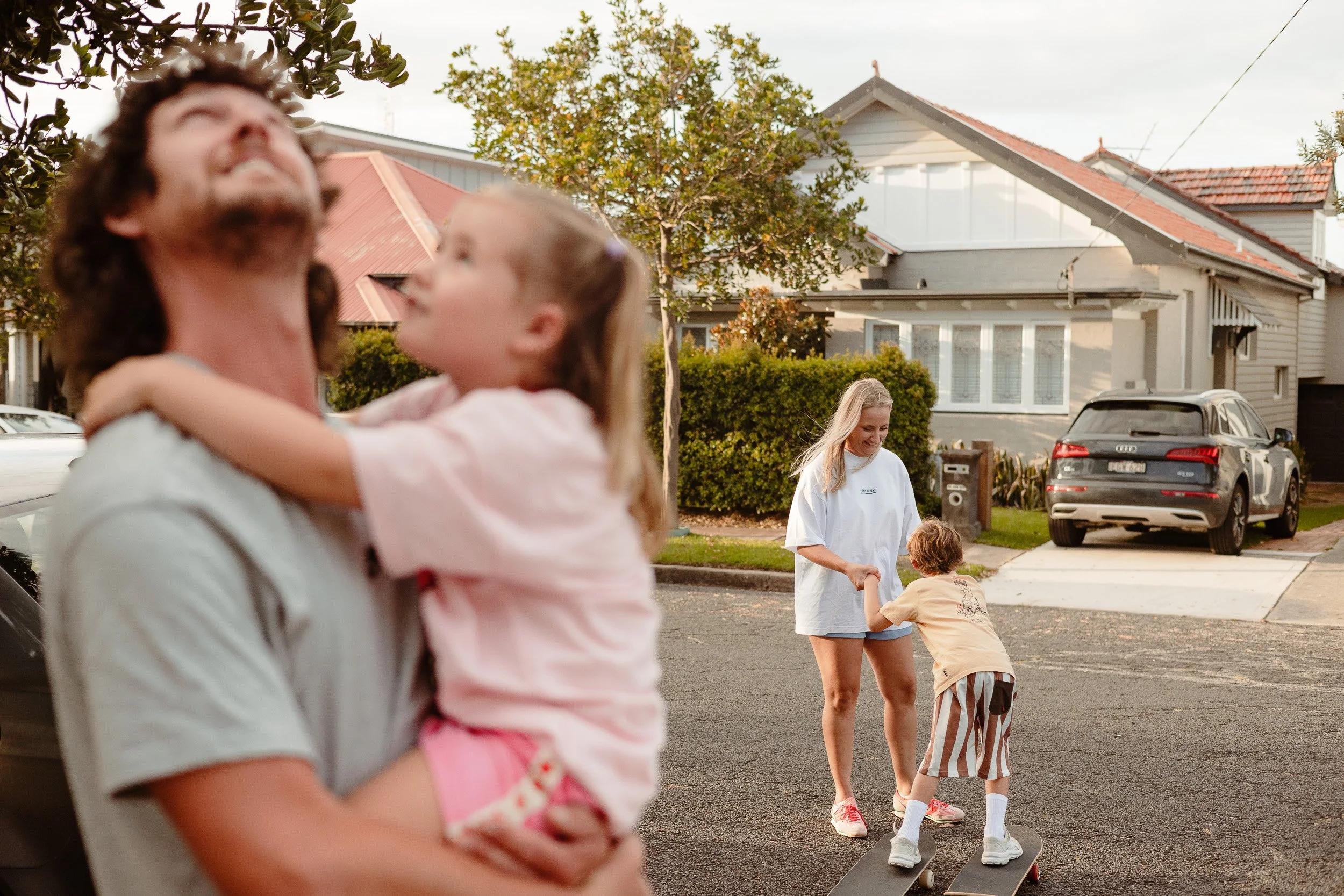 Family skateboarding through Merewether Newcastle documentary session by Daina Marie Photography