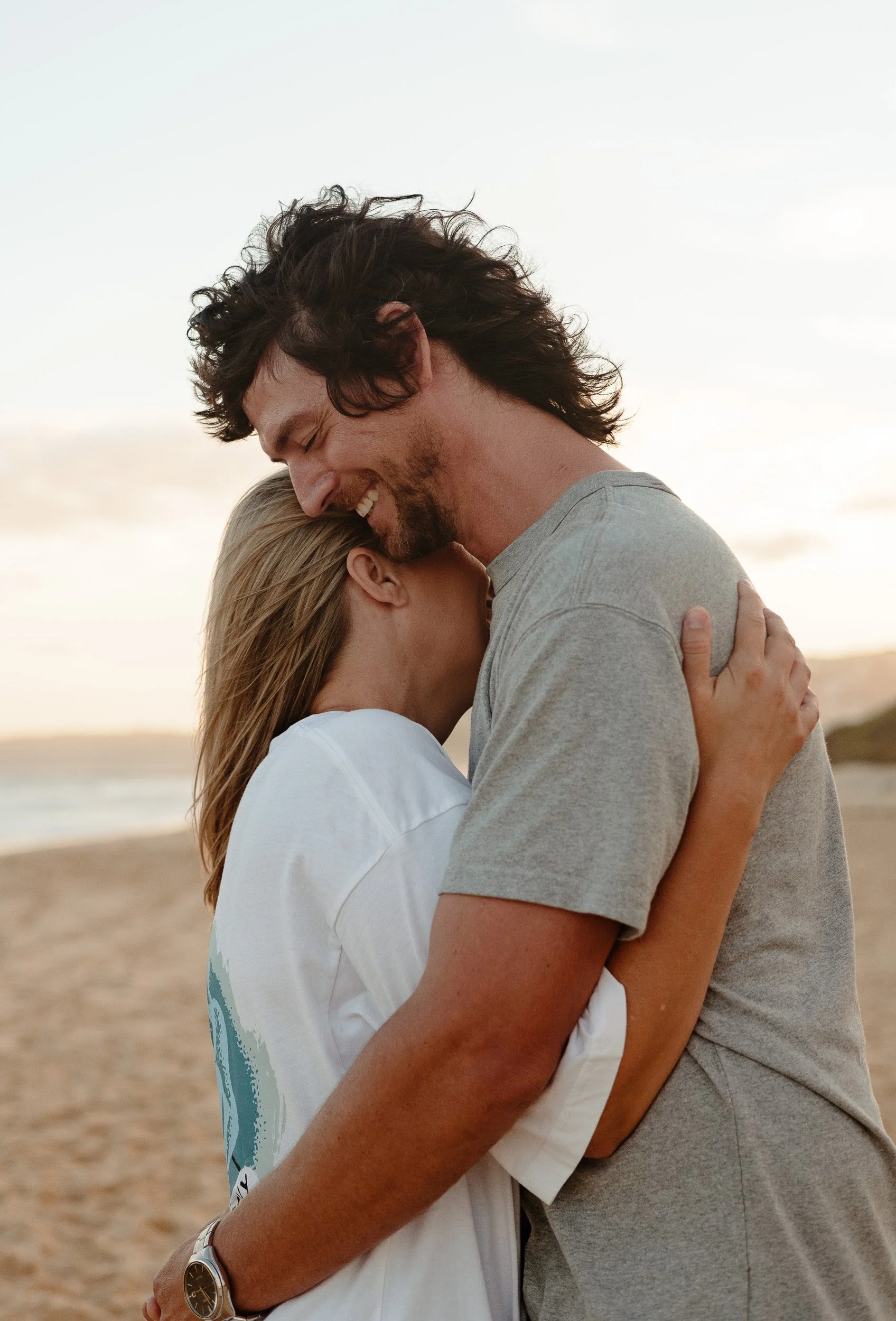 Newcastle documentary family photographer captures the Butcher family at Merewether Beach