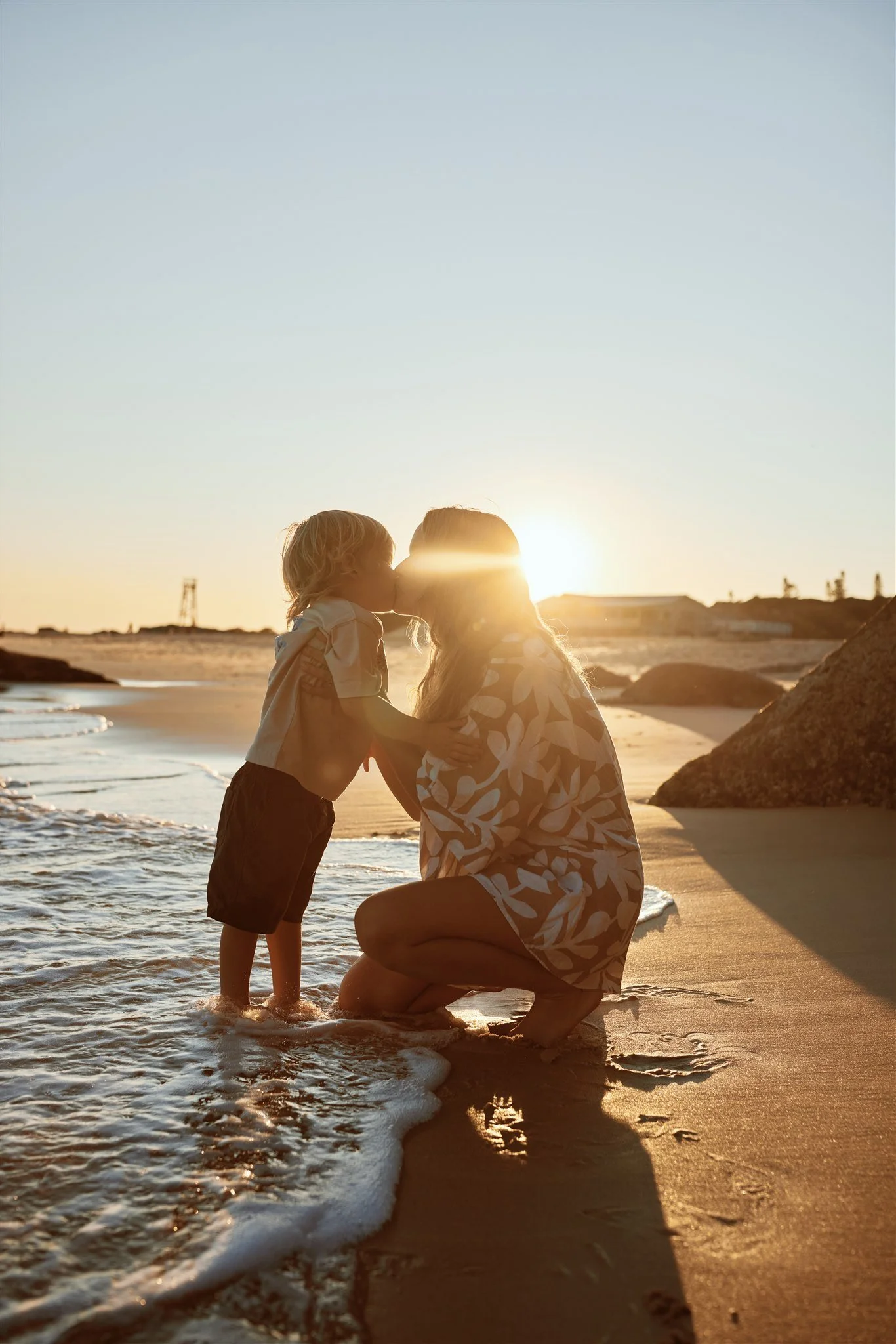 Toddler and primary school aged kids playing at Redhead Beach captured by Newcastle family photographer