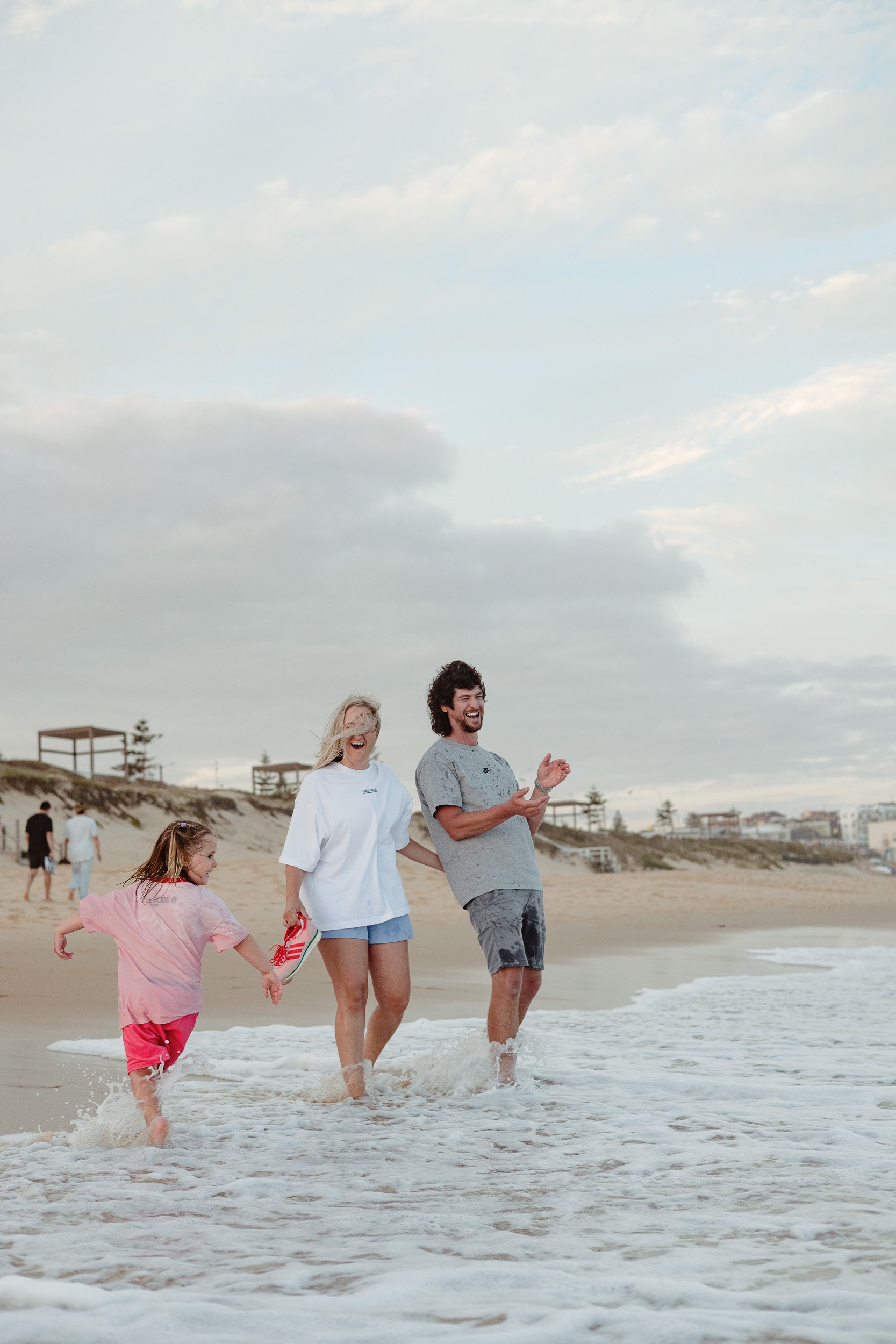 Heartfelt family moments at Merewether Beach Newcastle NSW by Daina Marie Photography
