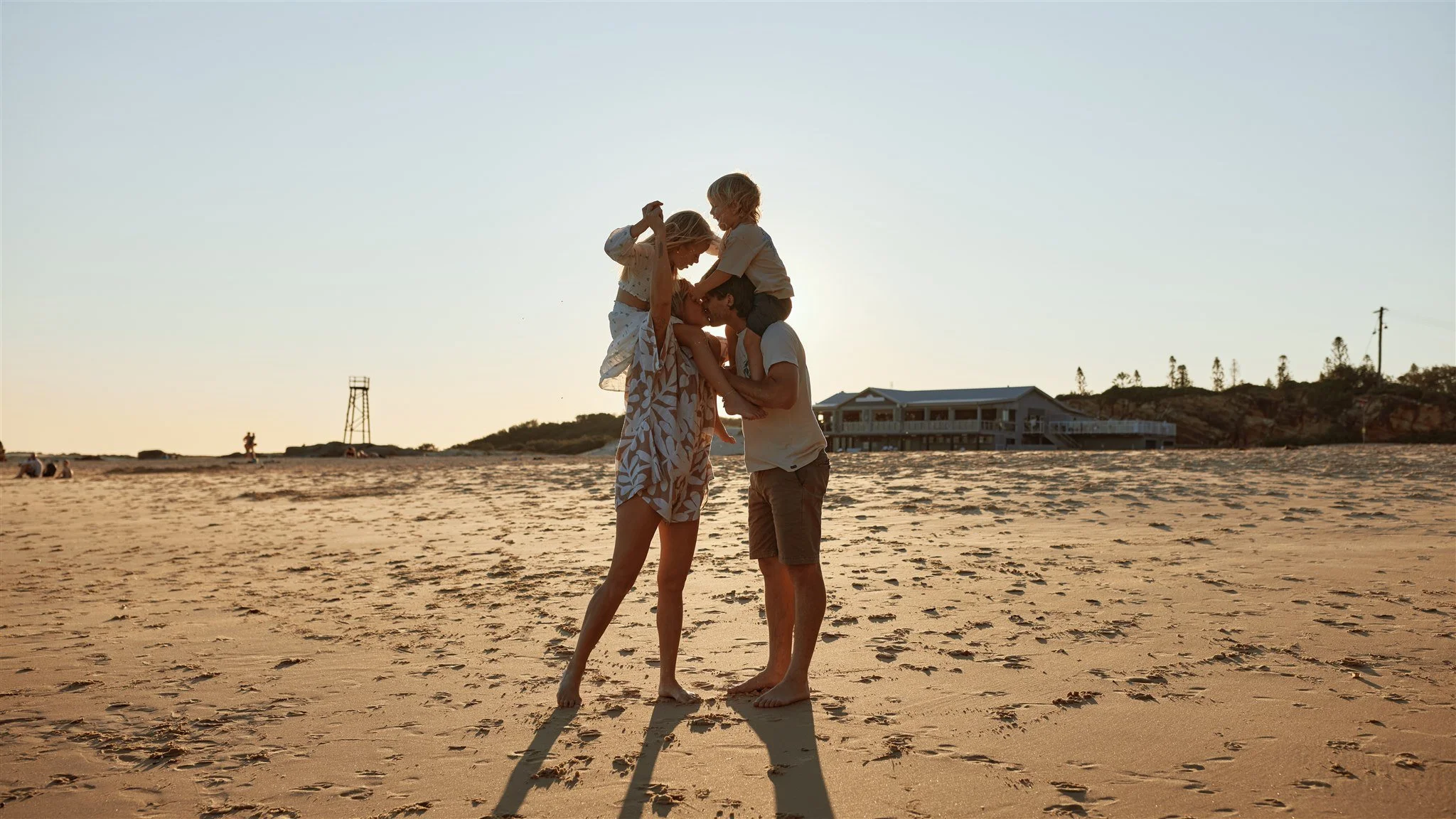 Family of four at Redhead Beach Newcastle photographed by Daina Marie Photography