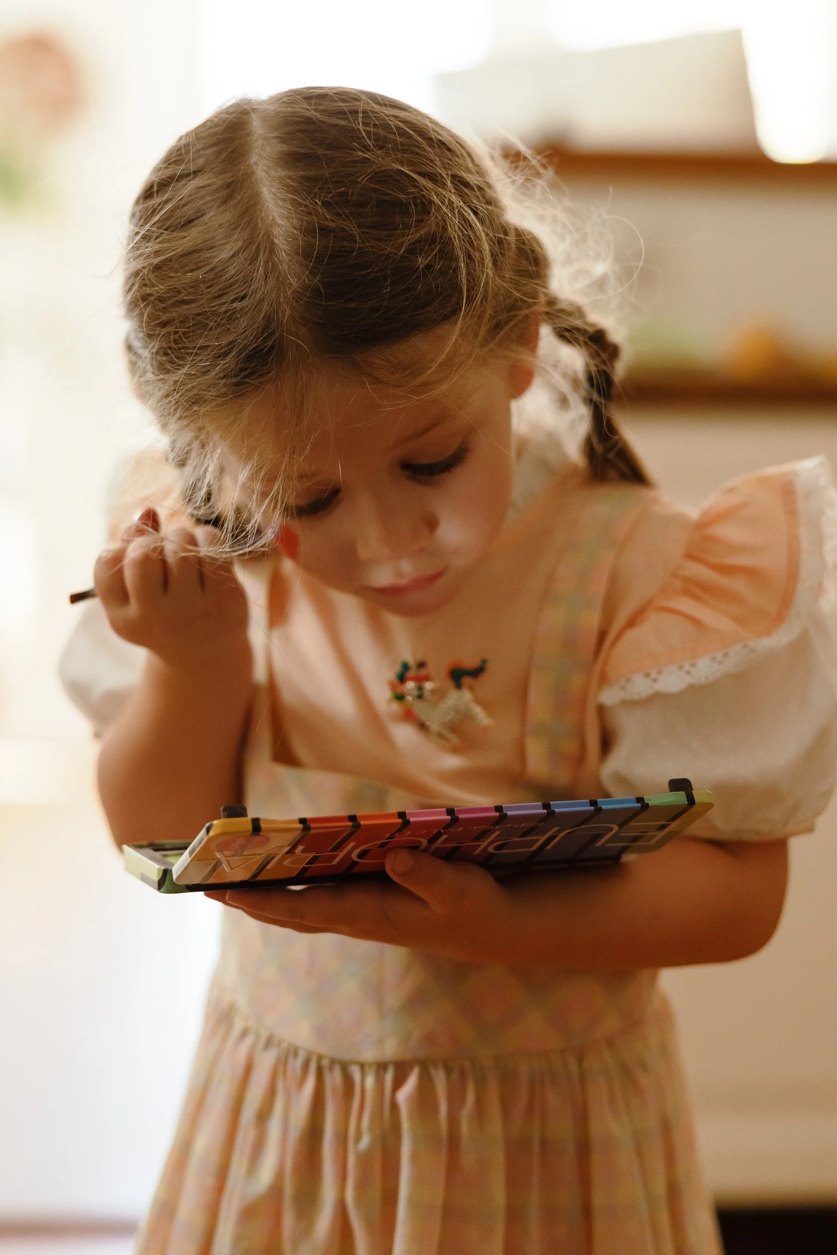 Newcastle family photographer documents in-home family moments for the Woollam family