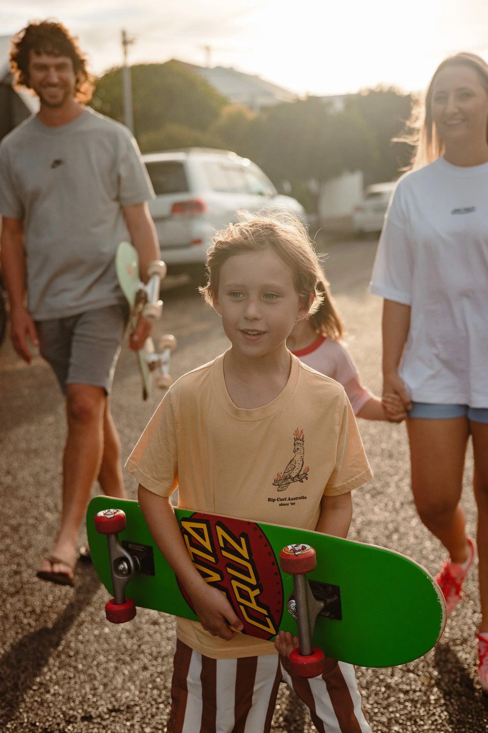 Family skateboarding through Merewether Newcastle documentary session by Daina Marie Photography