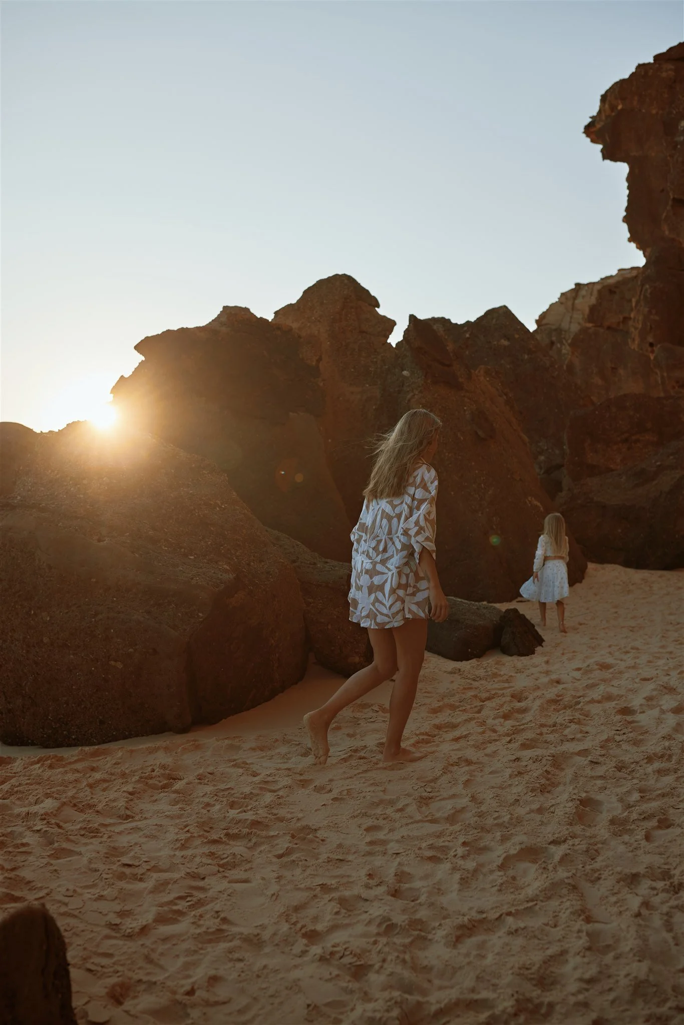 Toddler and primary school aged kids playing at Redhead Beach captured by Newcastle family photographer