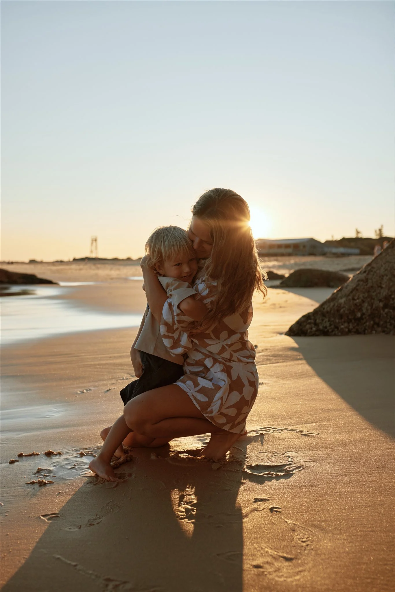 Family of four at Redhead Beach Newcastle photographed by Daina Marie Photography