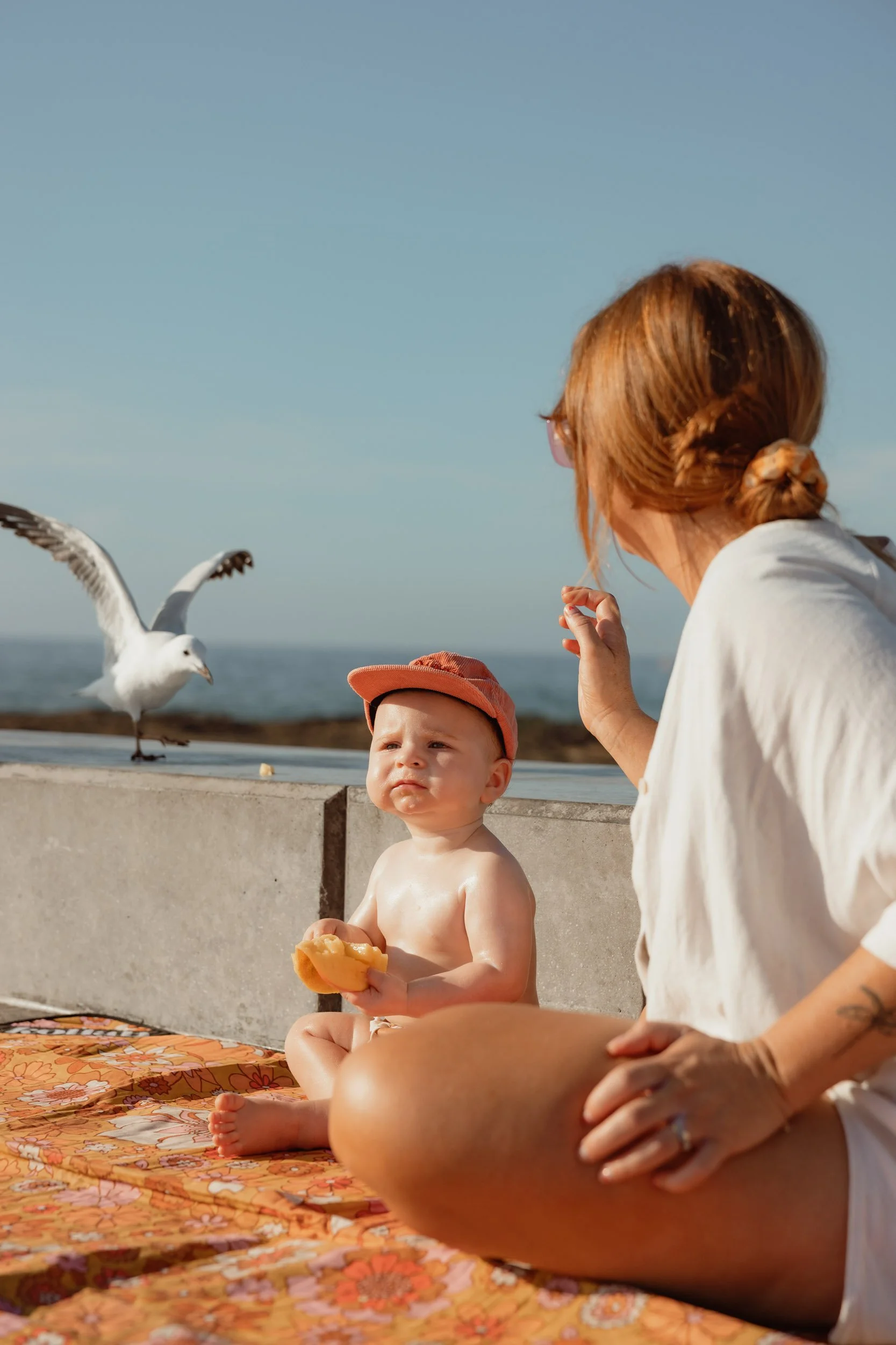 Baby's first summer at Newcastle Ocean Baths documentary family session Newcastle NSW