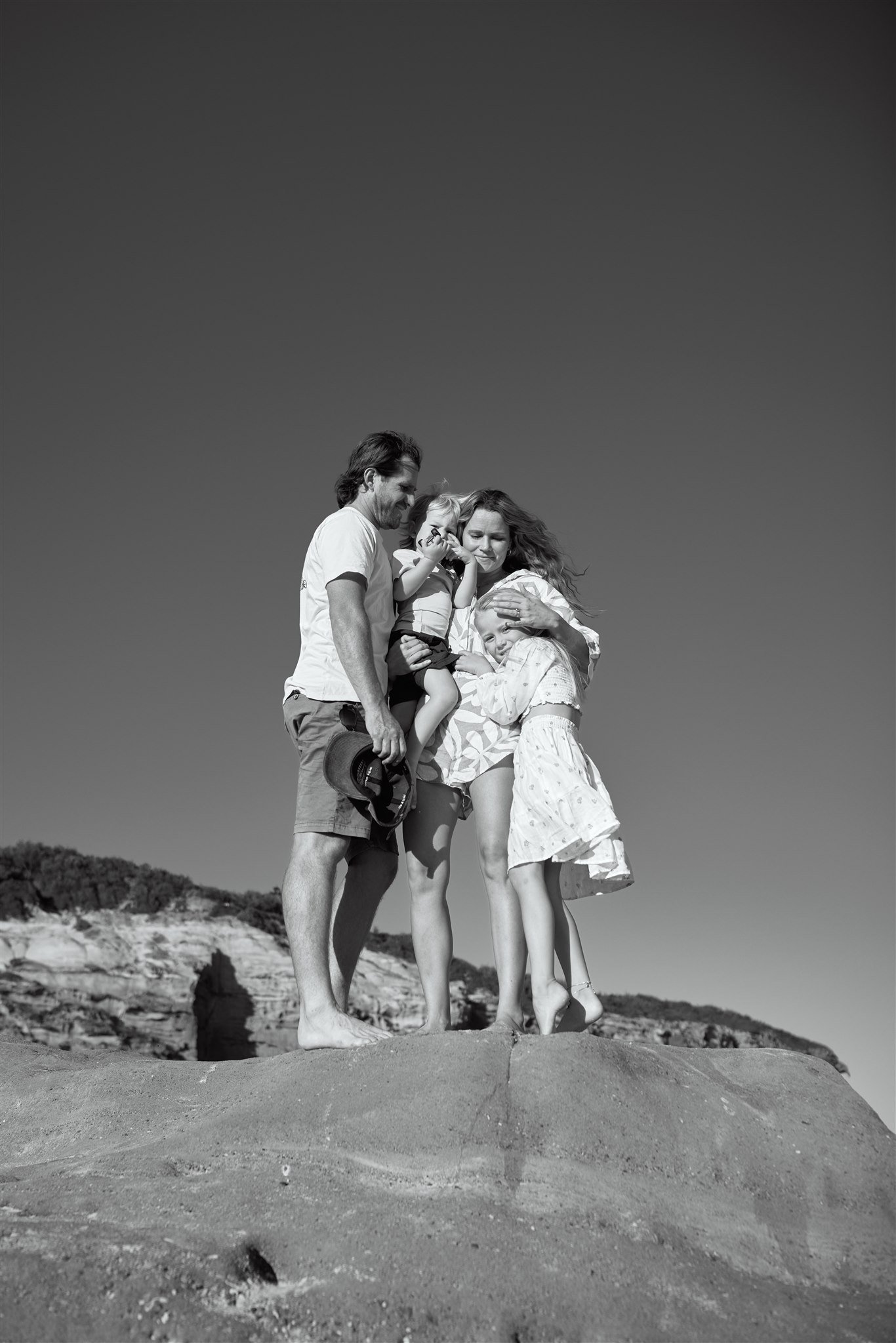 Newcastle documentary family photographer captures golden hour family session at Redhead Beach