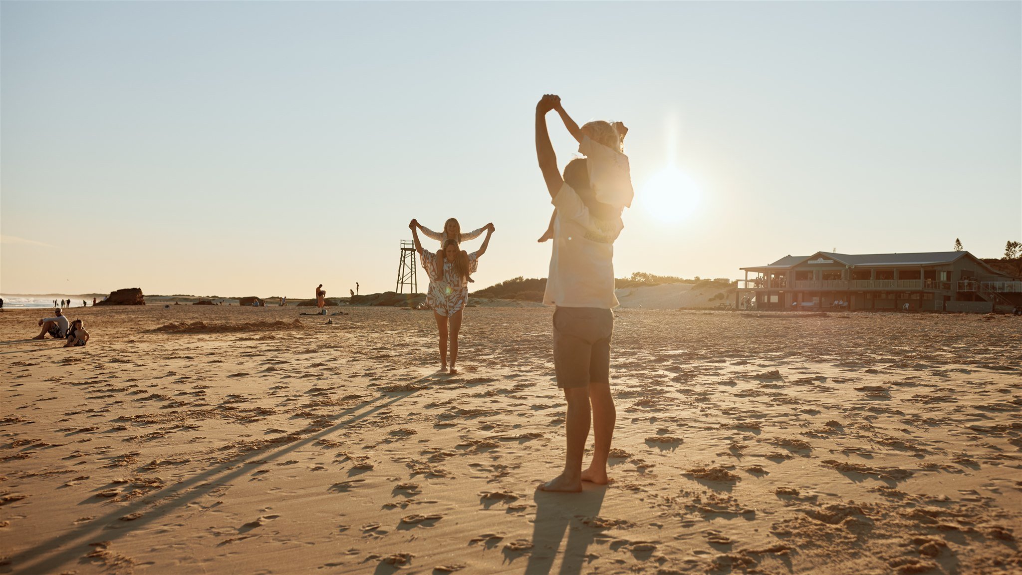 Newcastle documentary family photographer captures golden hour family session at Redhead Beach