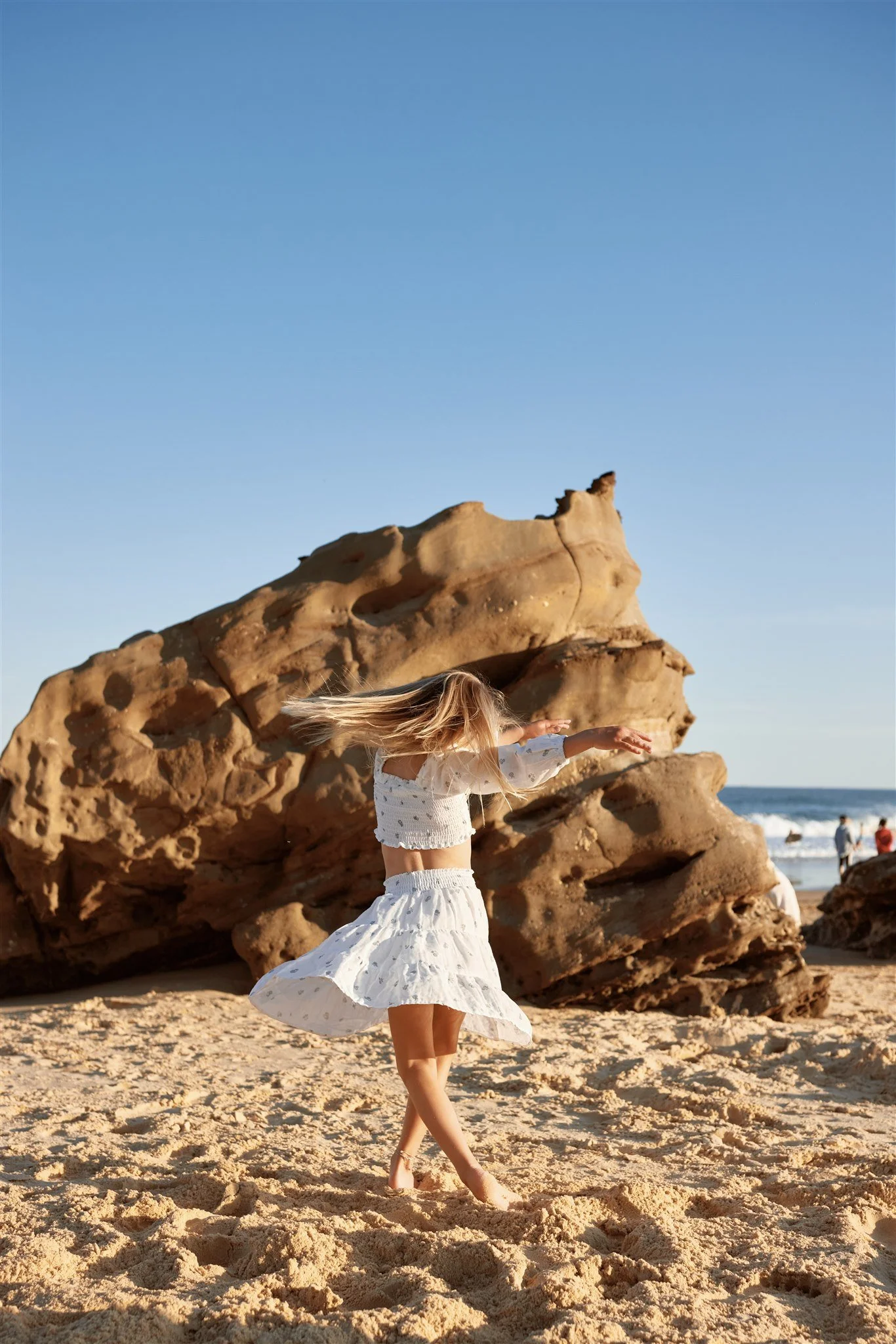 Family of four at Redhead Beach Newcastle photographed by Daina Marie Photography