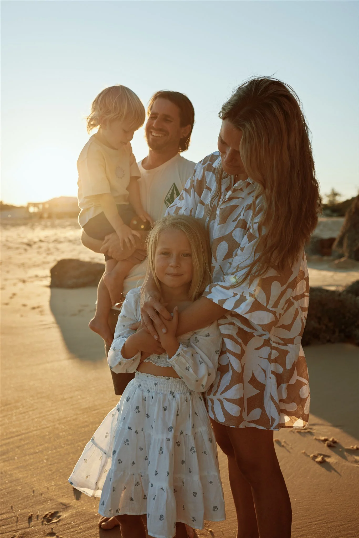 Heartfelt golden hour family moments at Redhead Beach Newcastle by Daina Marie Photography