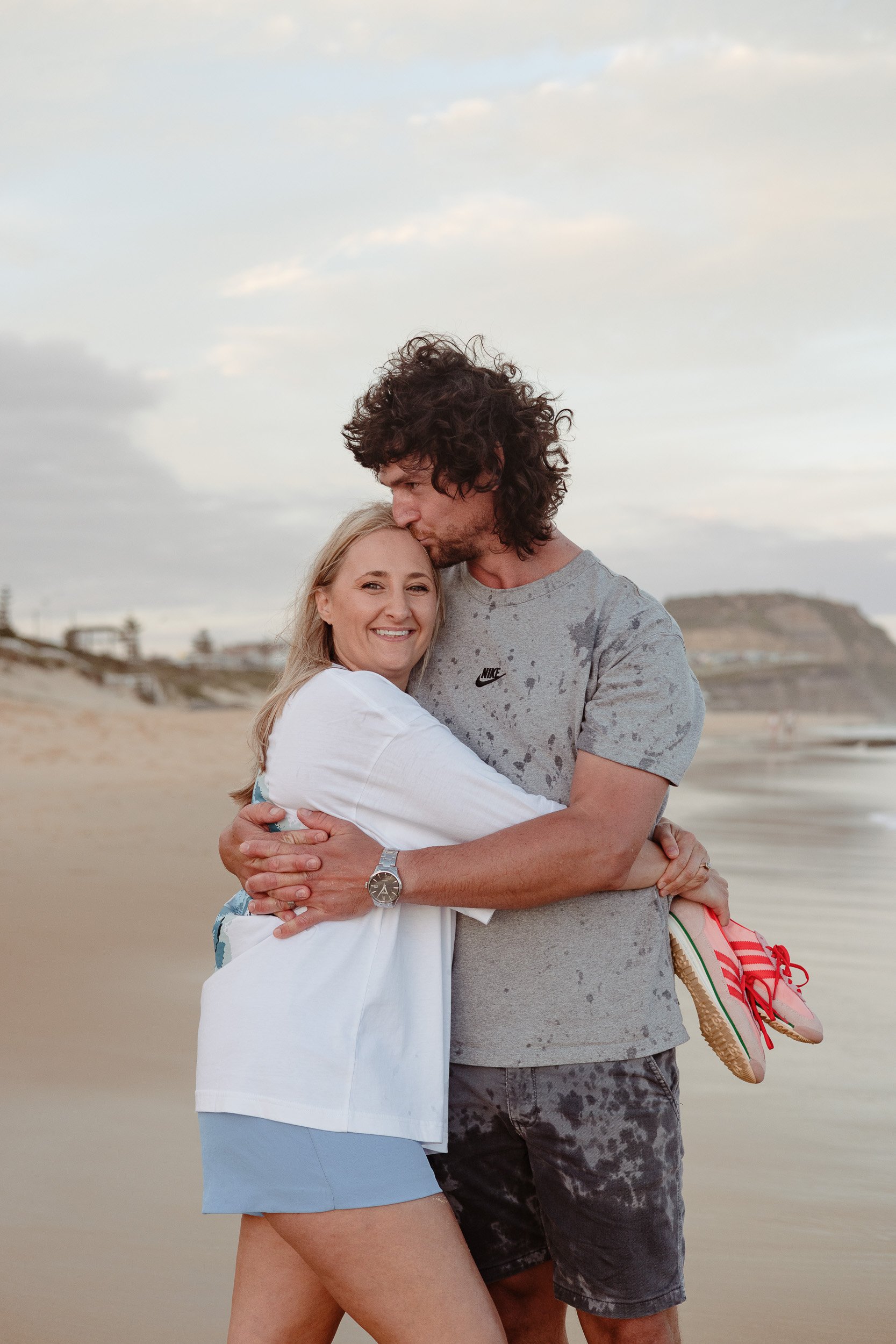 Newcastle documentary family photographer captures the Butcher family at Merewether Beach